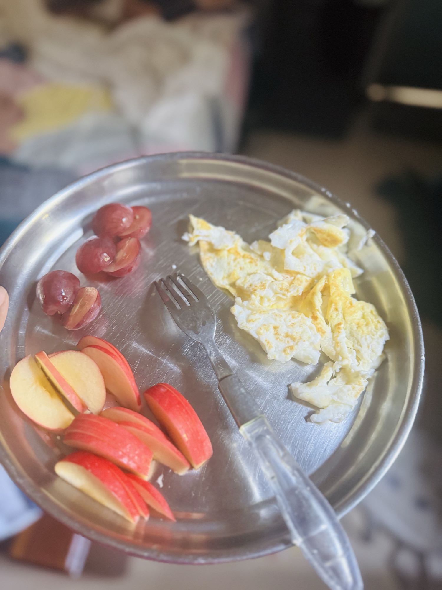 Eggs, apple, grapes plate