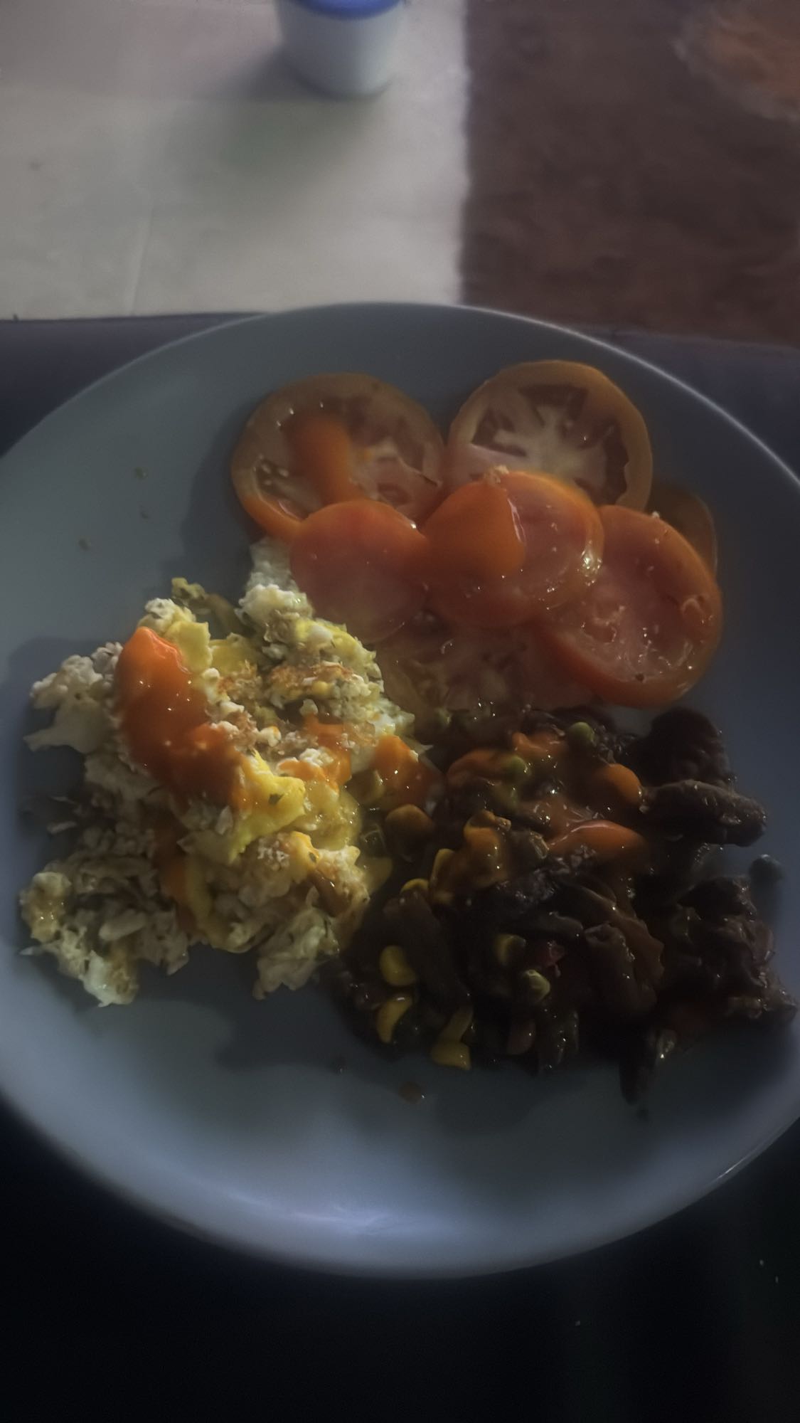 Eggs, beef, tomato plate