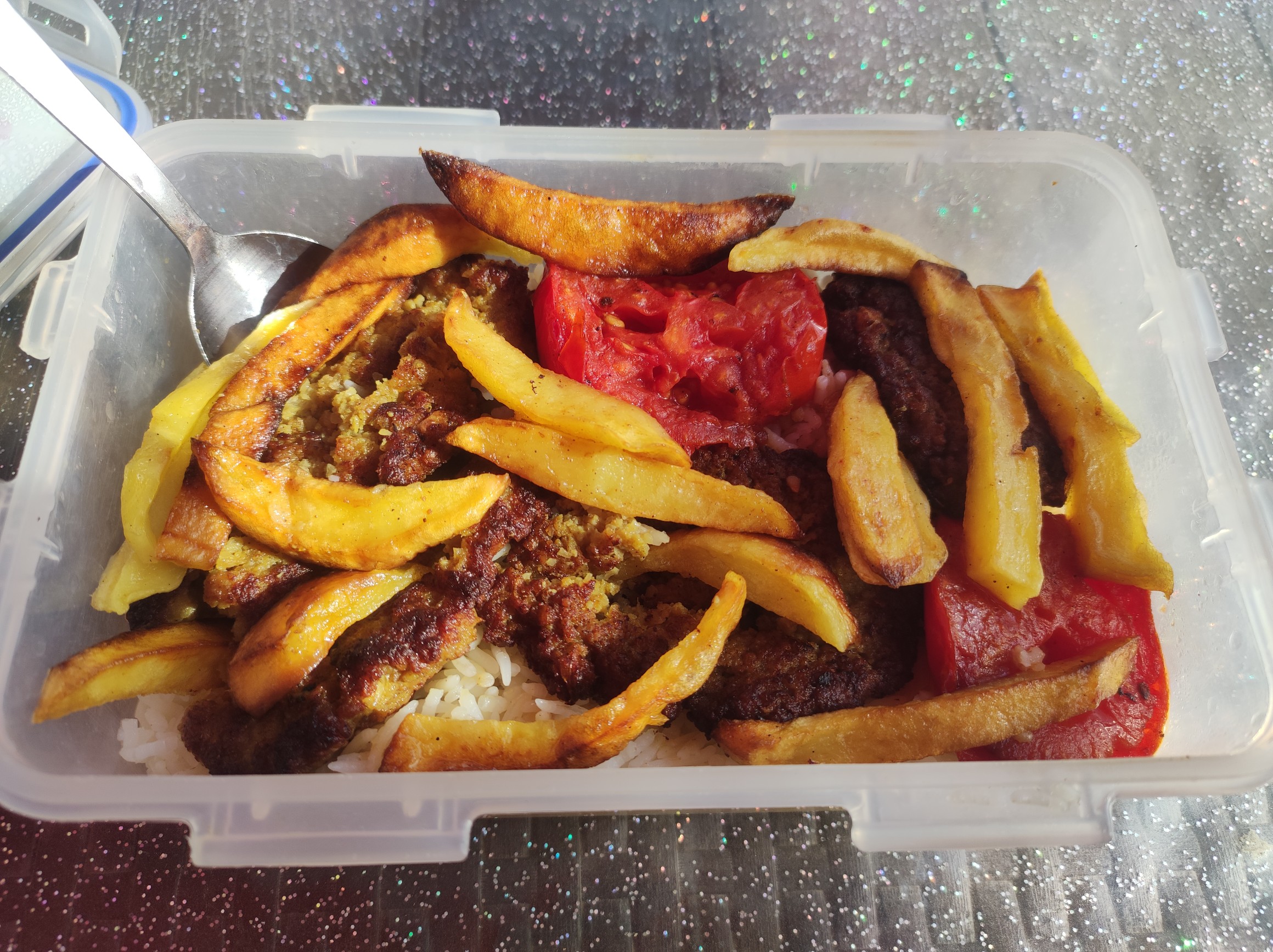 Kebab with fries and rice