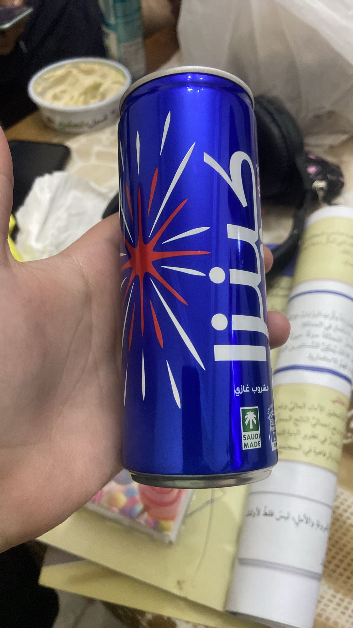 Blue carbonated soda can