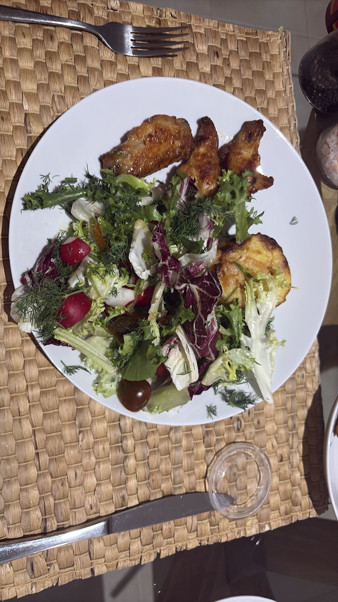 Chicken wings and salad