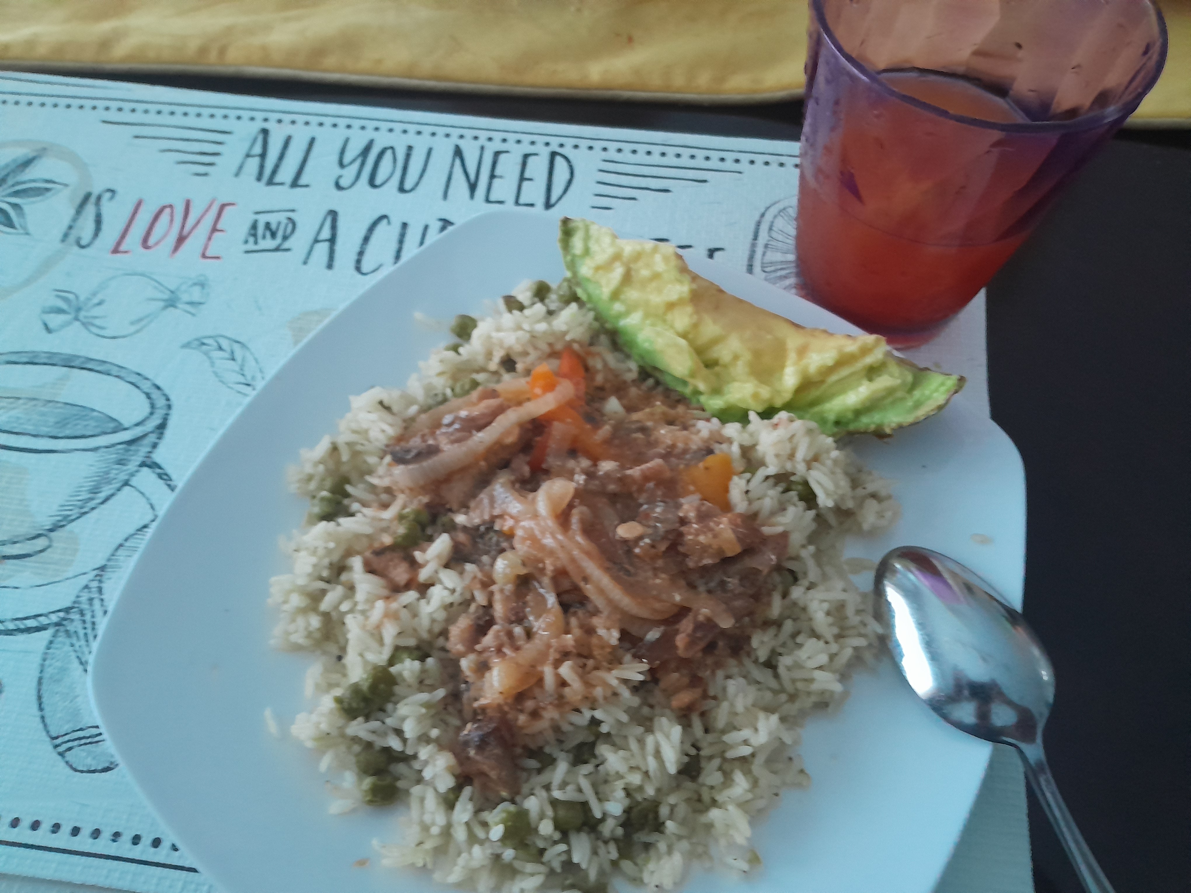 Rice with beef stew and avocado