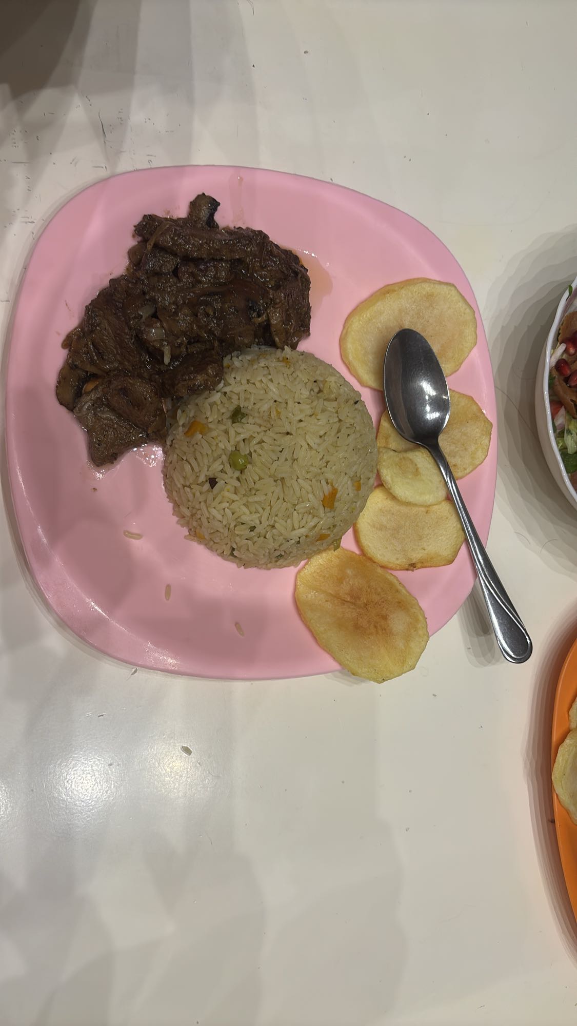 Beef, rice, and chips plate