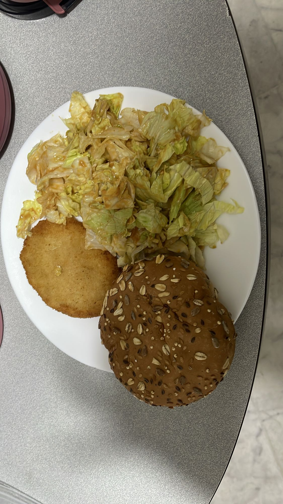 Chicken burger with salad