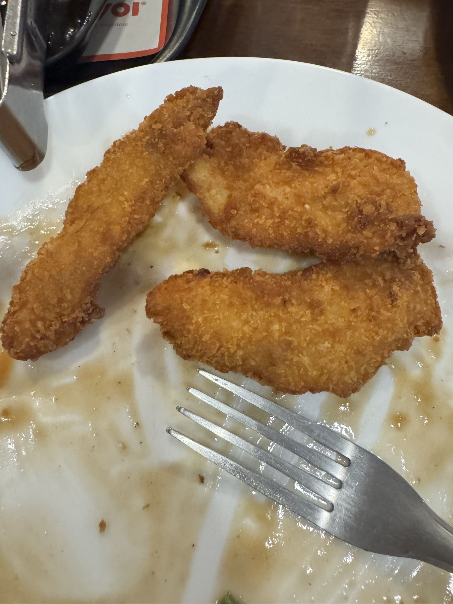 Tiras de frango empanado