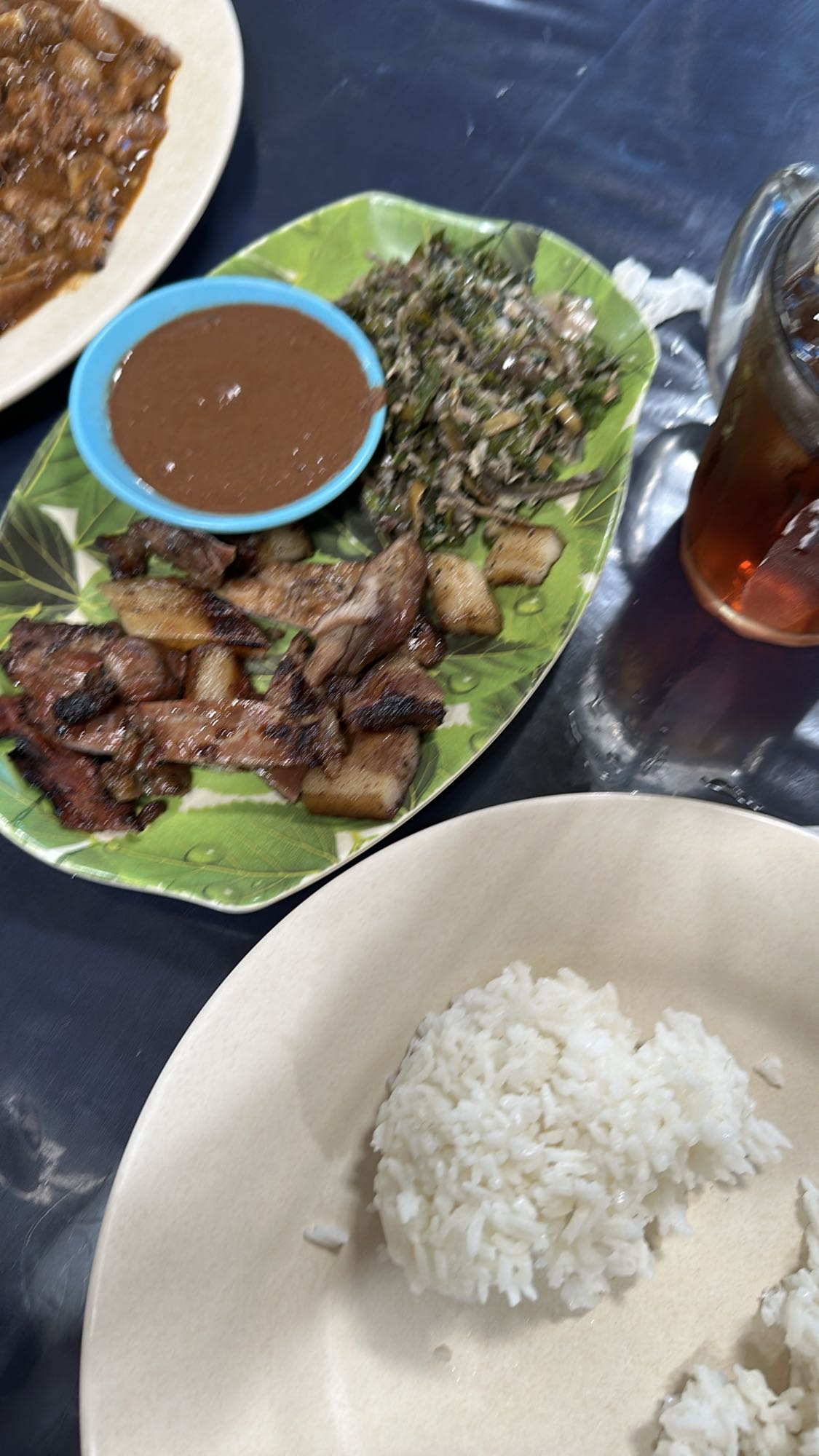 grilled pork, rice, greens