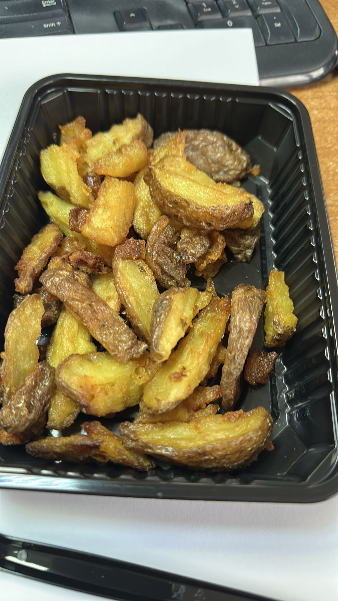 Fried potato wedges