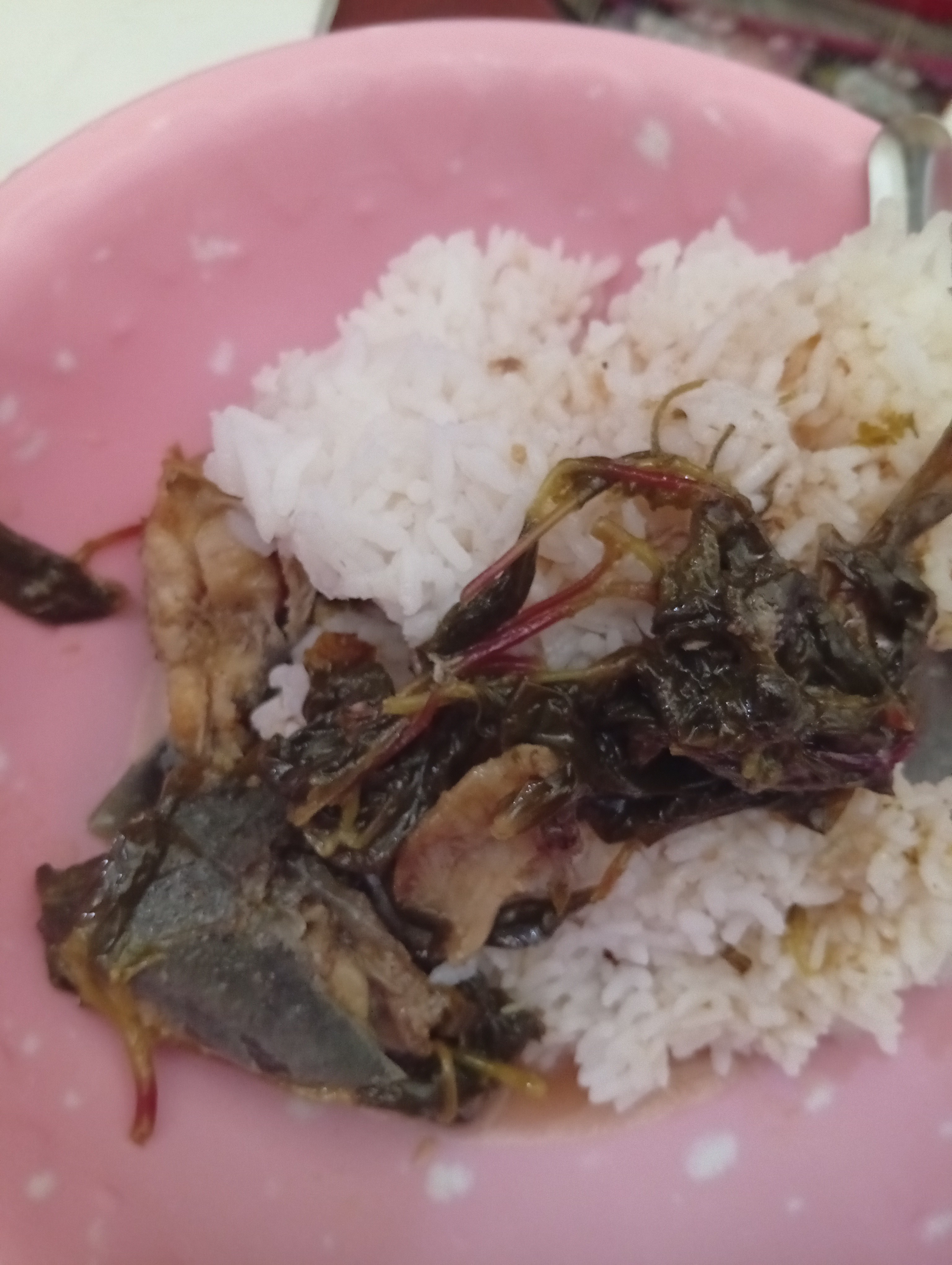 Rice with fish and greens