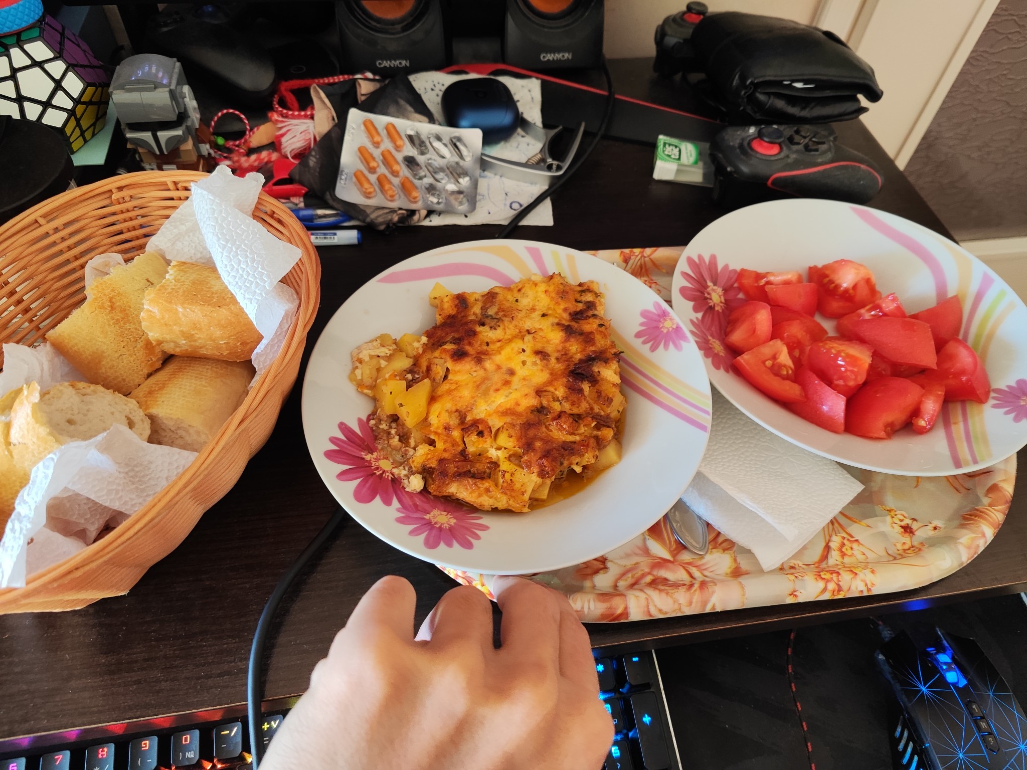 Lasagna, bread, tomato salad