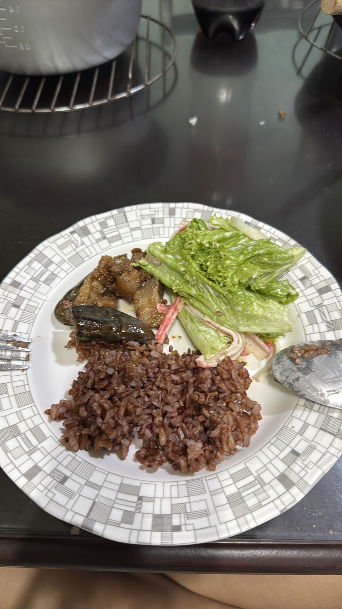 Red rice with salad and pork binagoongan