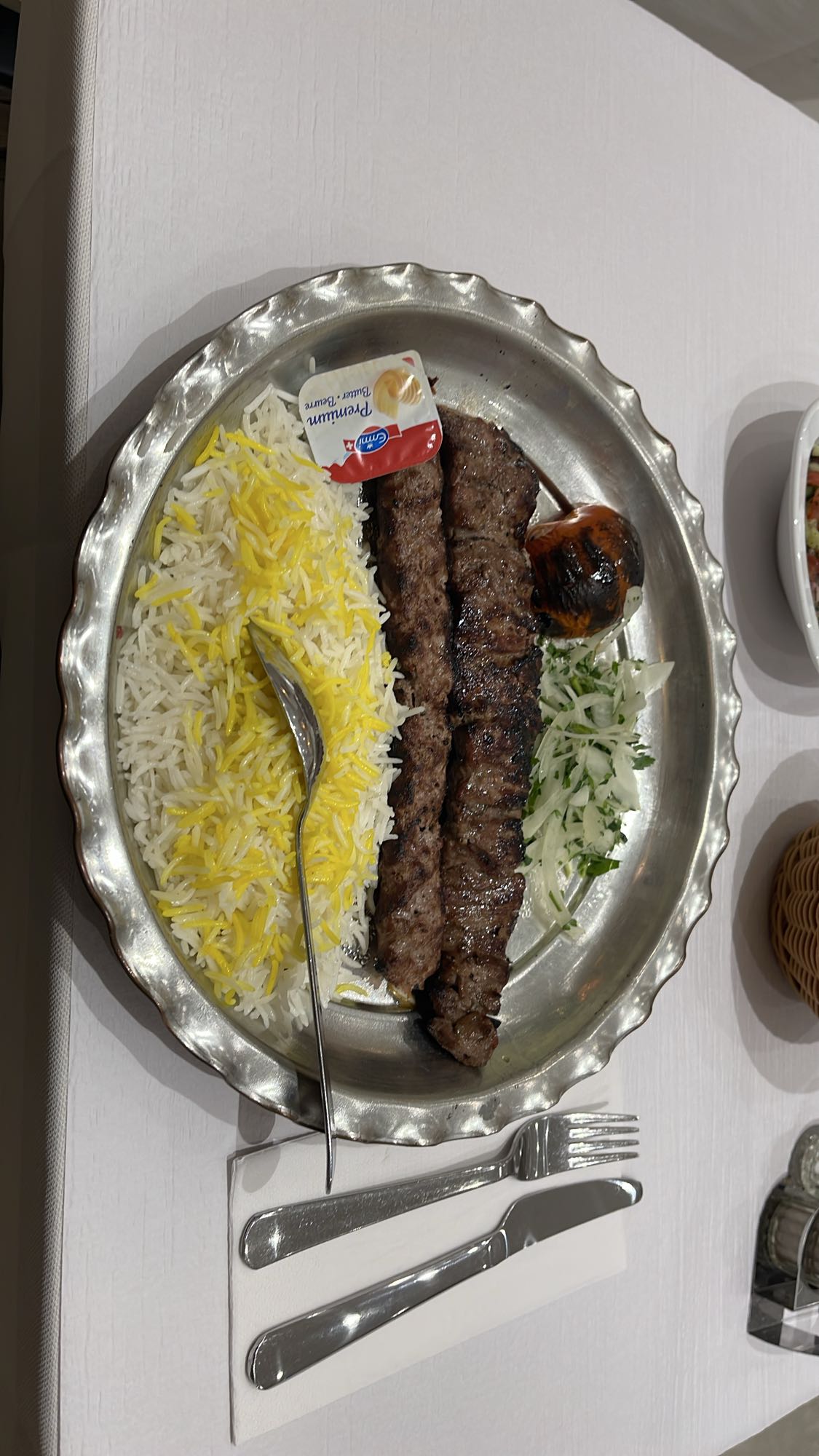 Kebab with rice and butter