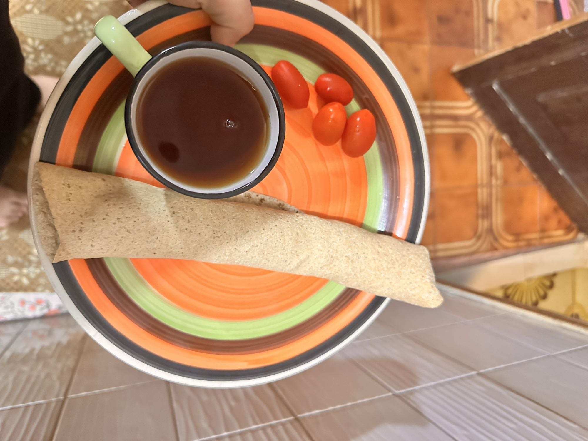 Flatbread, tea, tomatoes