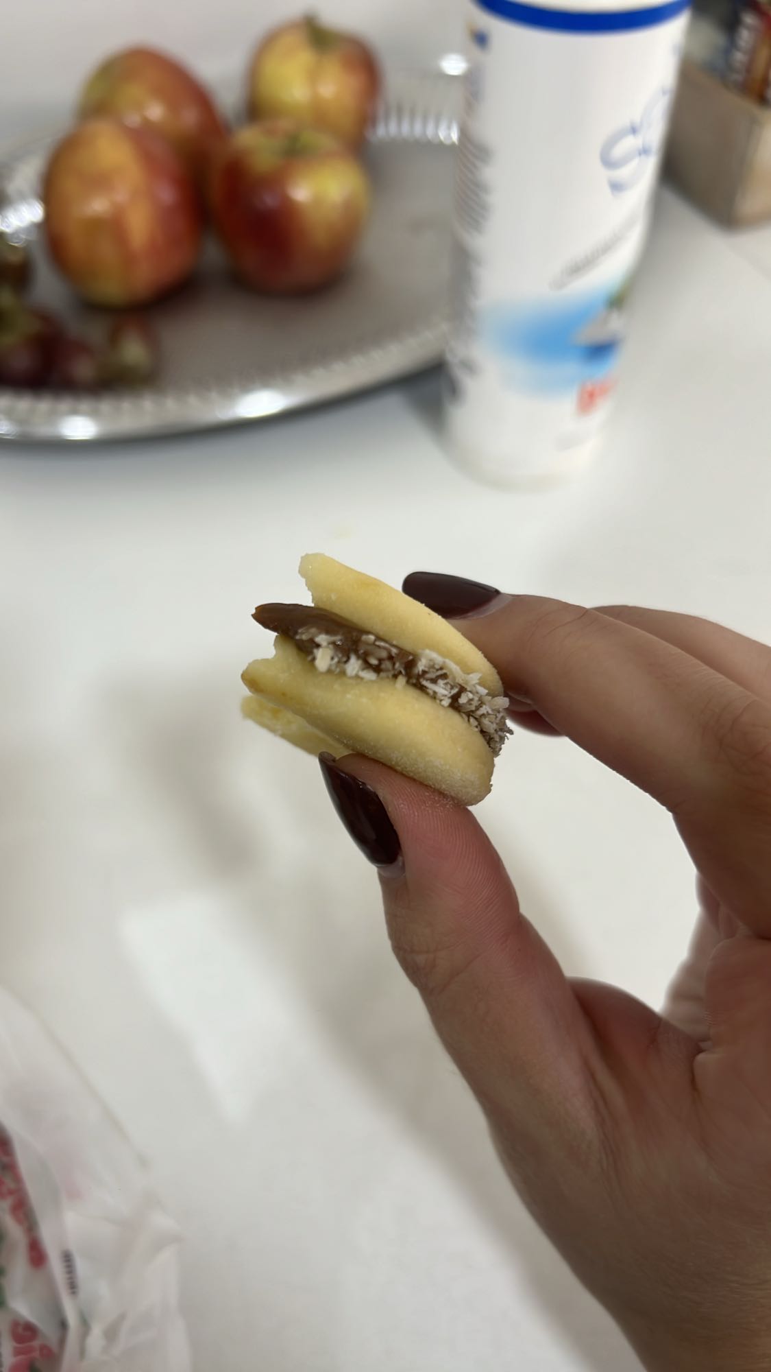 Chocolate coconut sandwich cookie