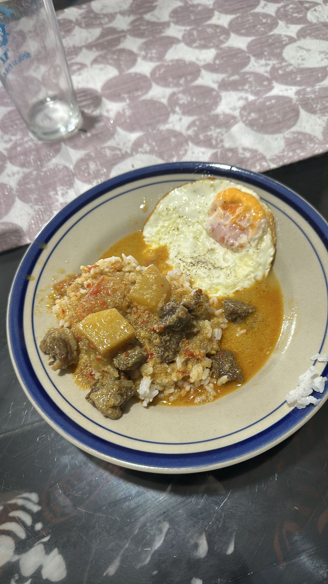 Rice with beef curry and egg
