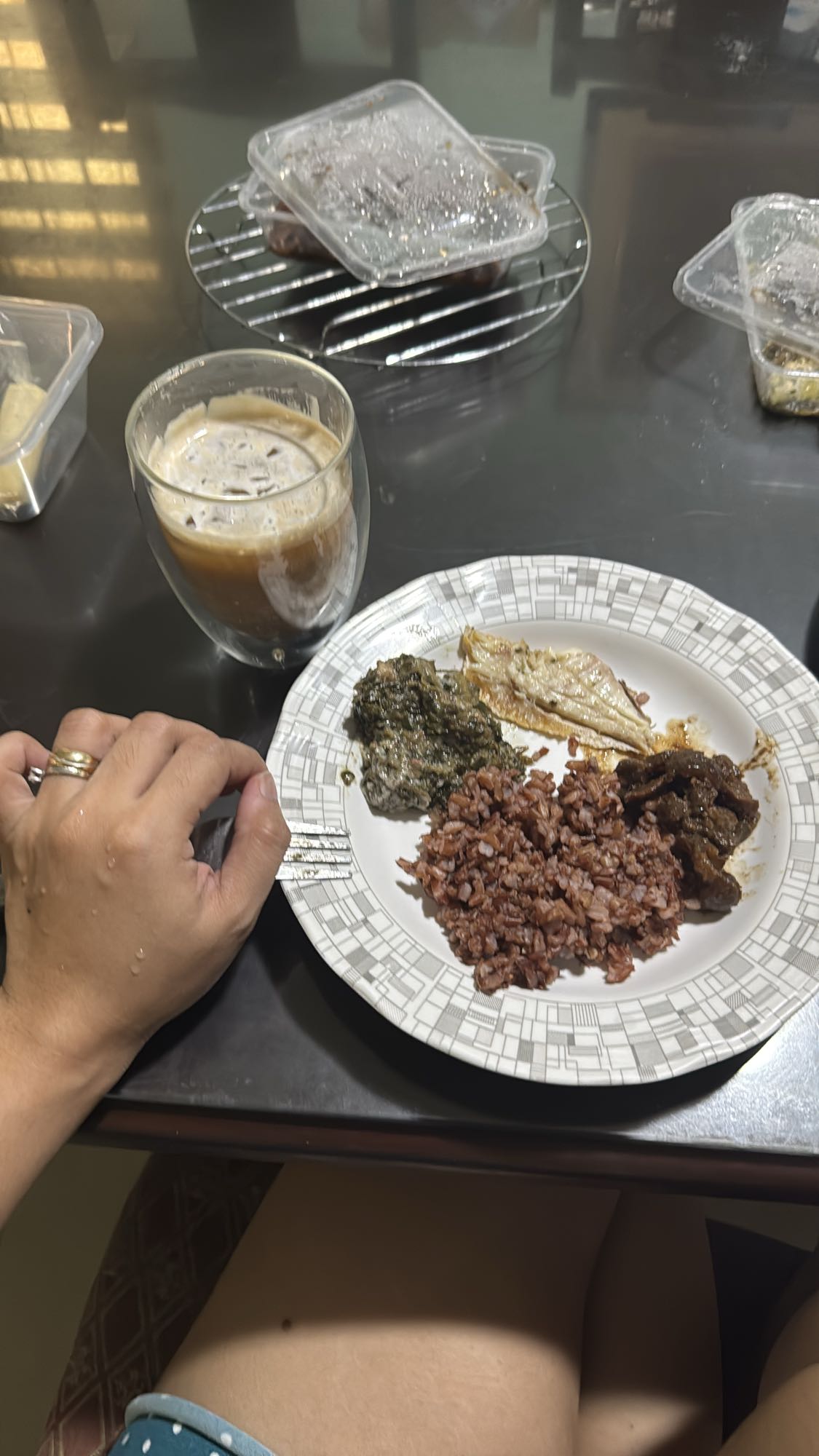 Red rice with fish and greens