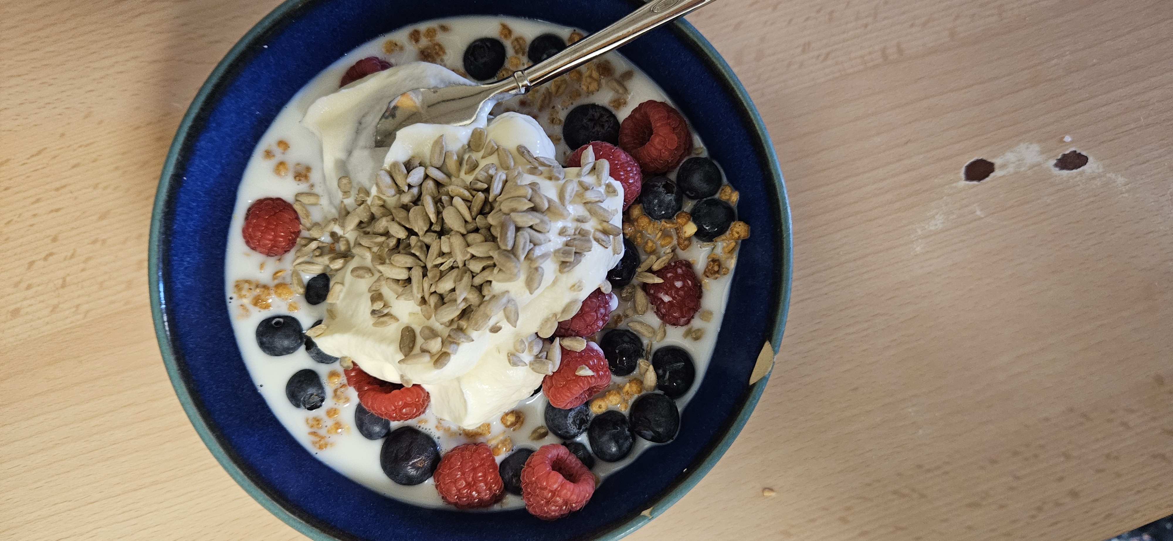 Yogurt berry granola bowl