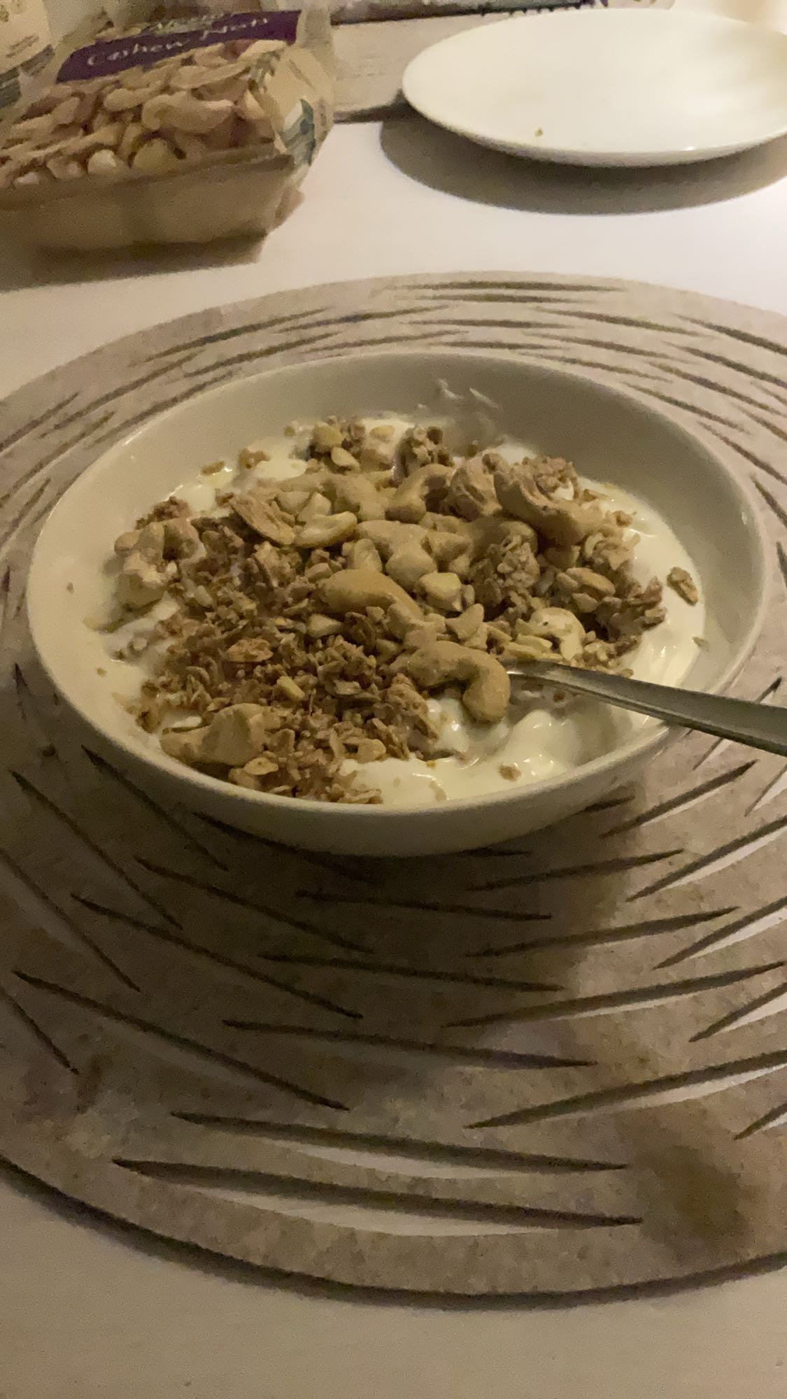 Yogurt with granola and cashews