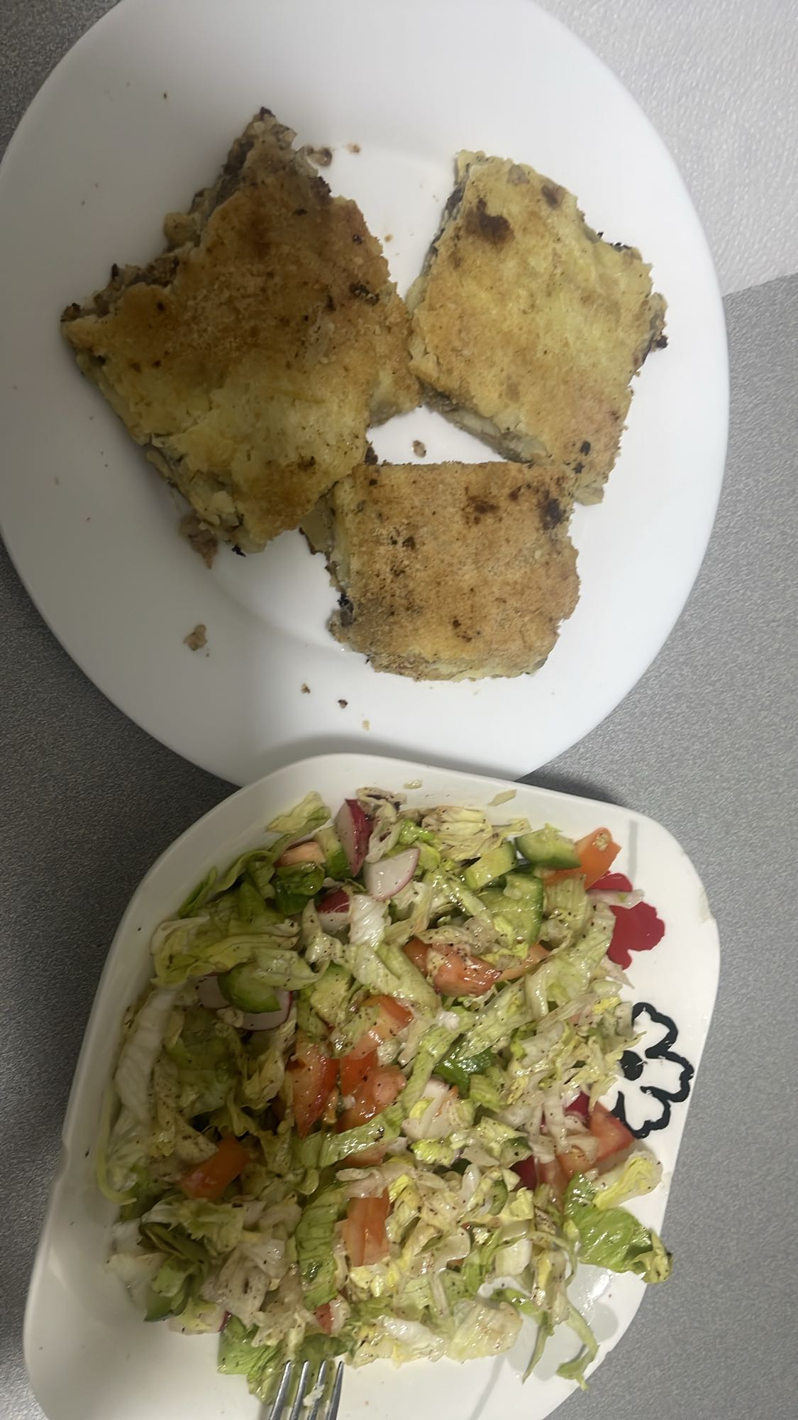 Baked squares with salad