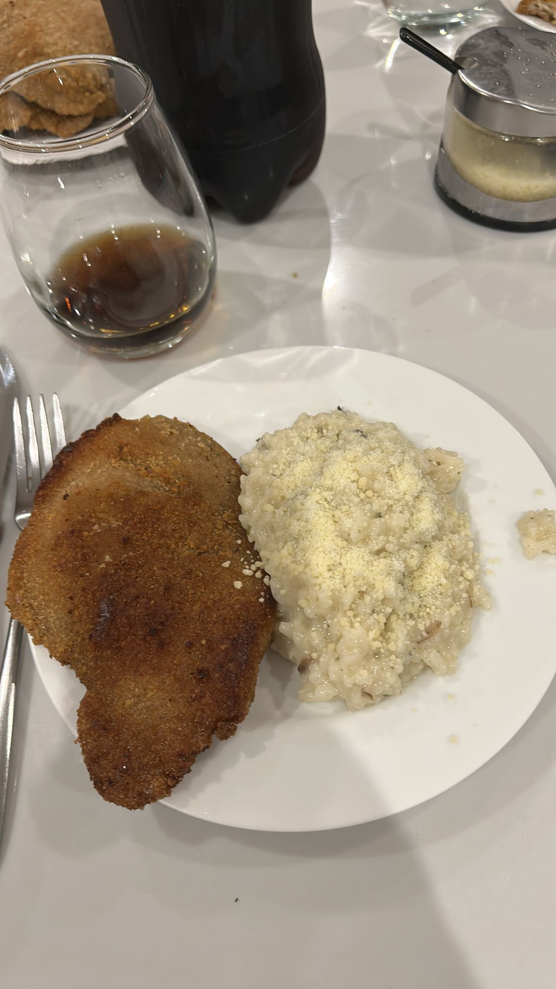 Milanesa con risotto
