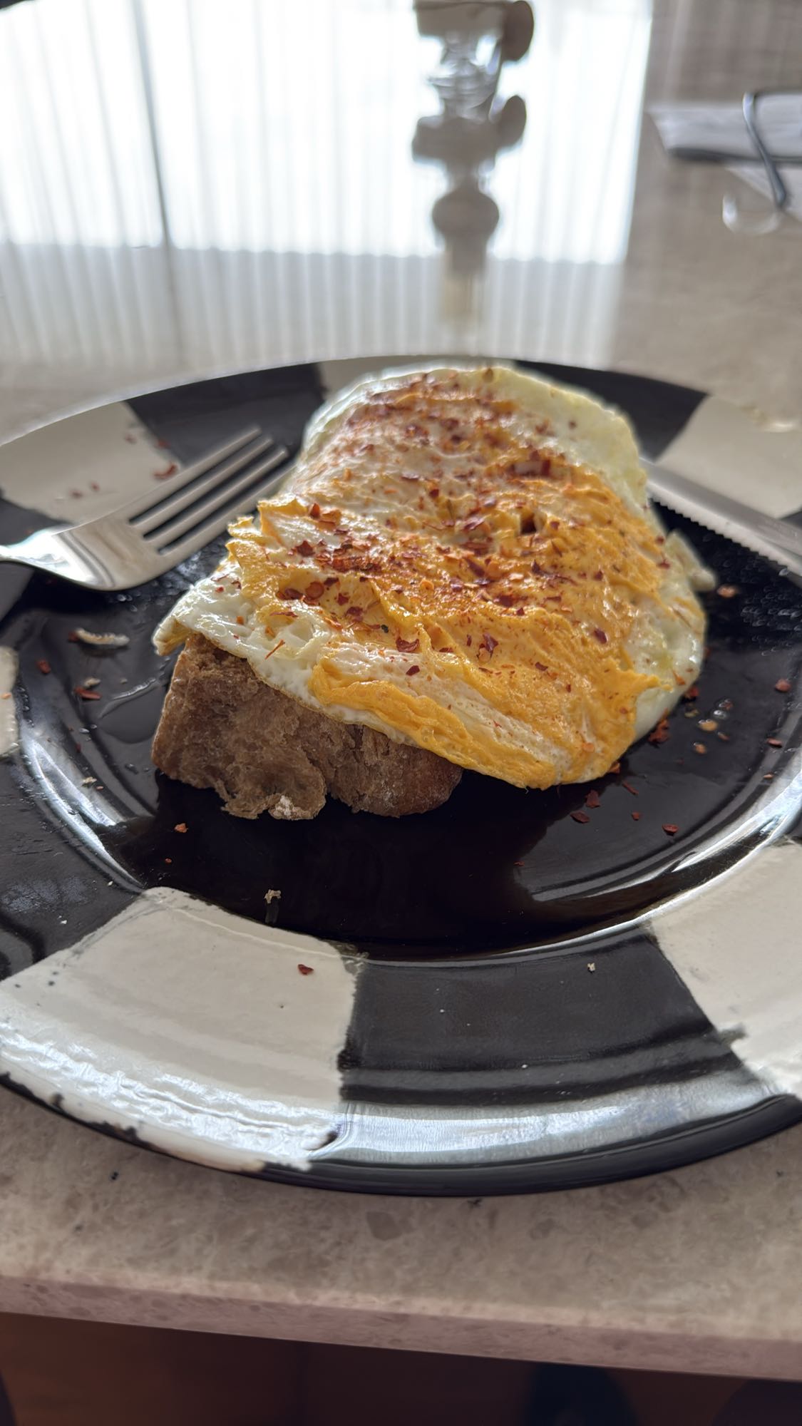 Egg toast with chili flakes