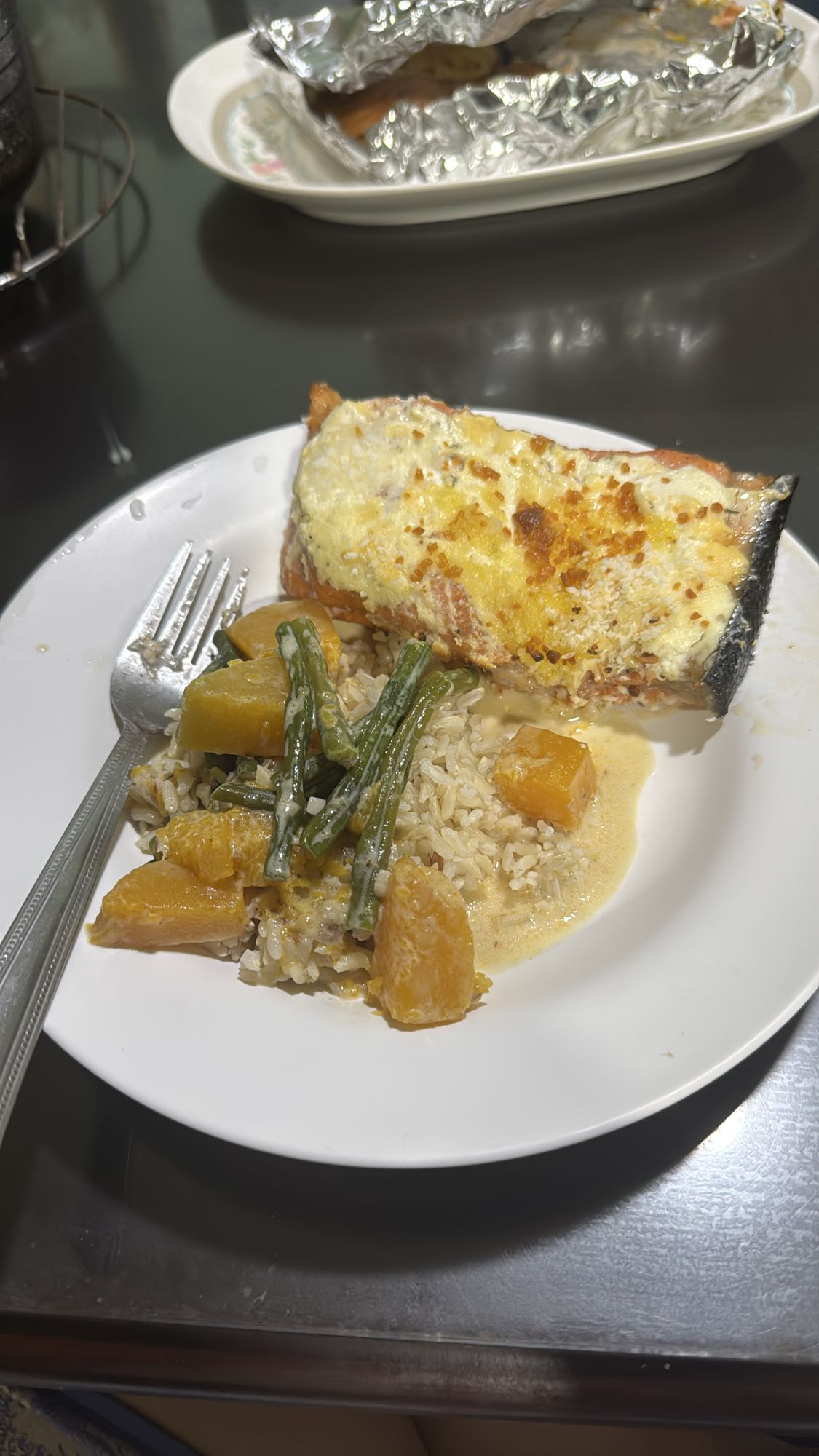 Baked salmon with rice and veg