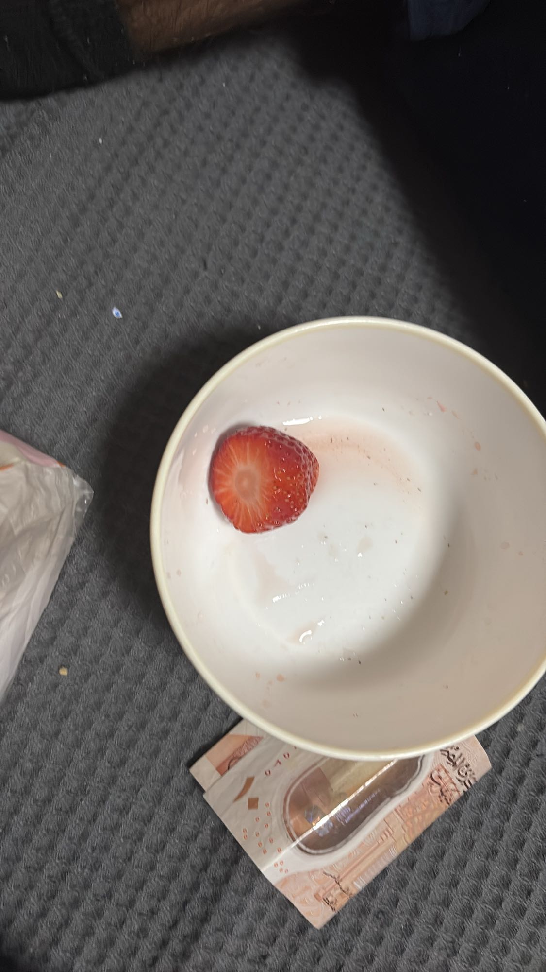 Half Strawberry in Bowl