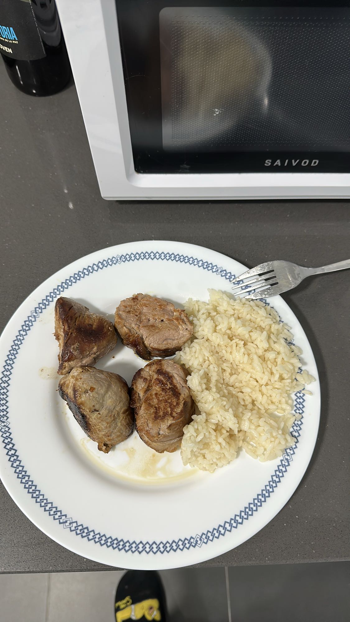 Cerdo con arroz blanco