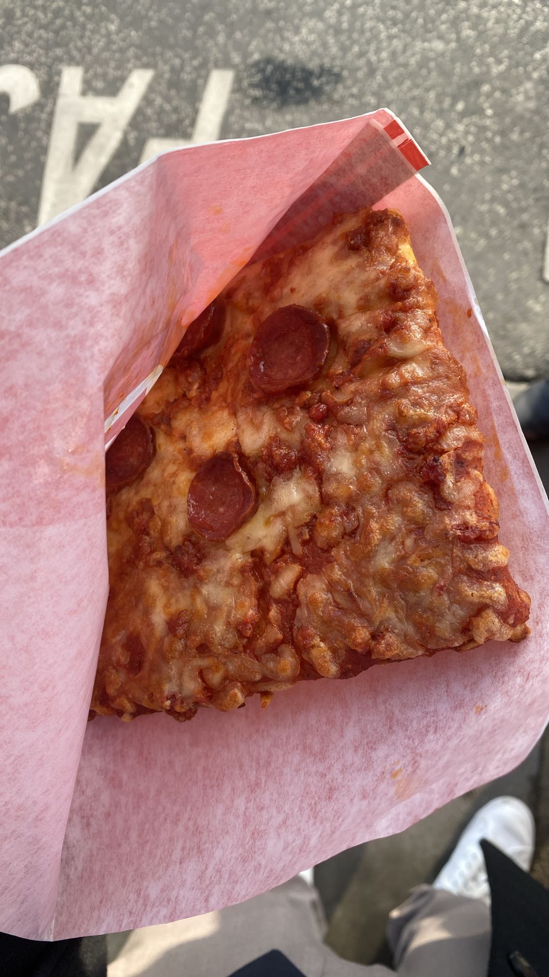 Pepperoni pizza slice