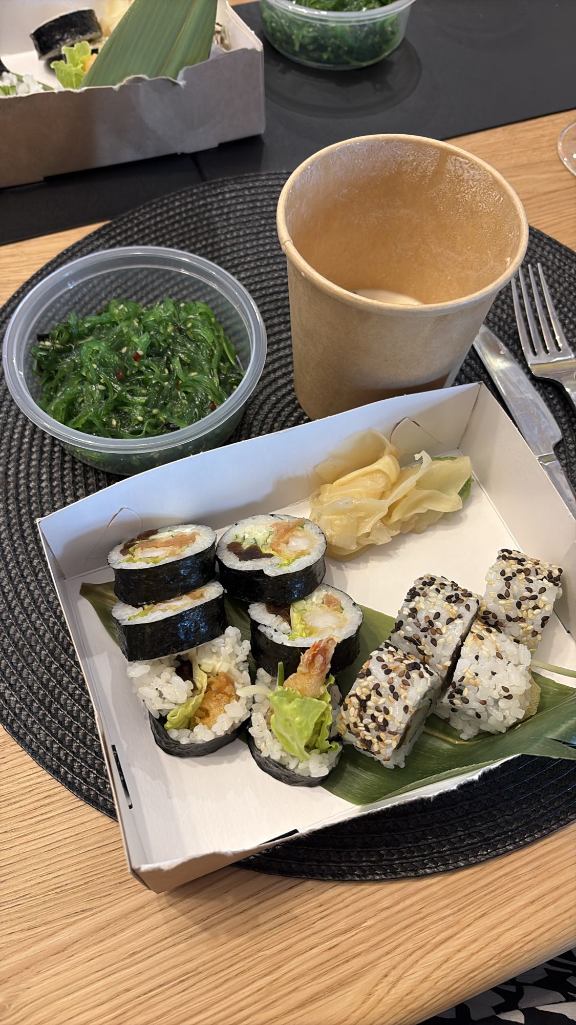 Sushi with seaweed salad
