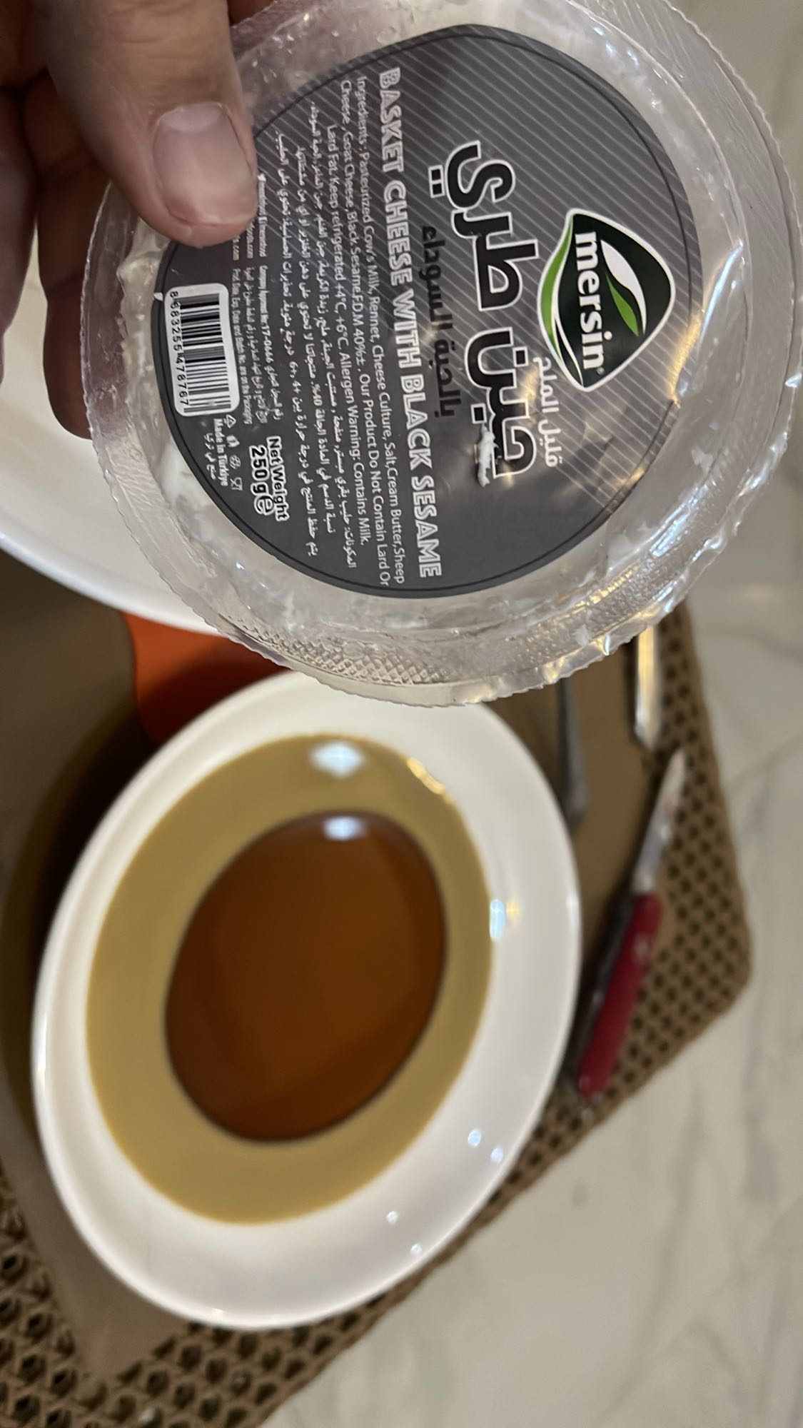 Cheese with dates syrup and tahini with barley bread