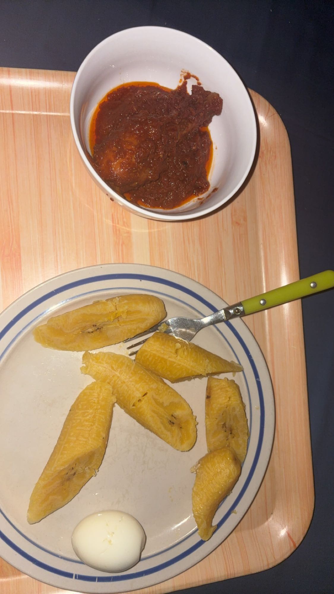 Boiled plantain, egg, chicken stew