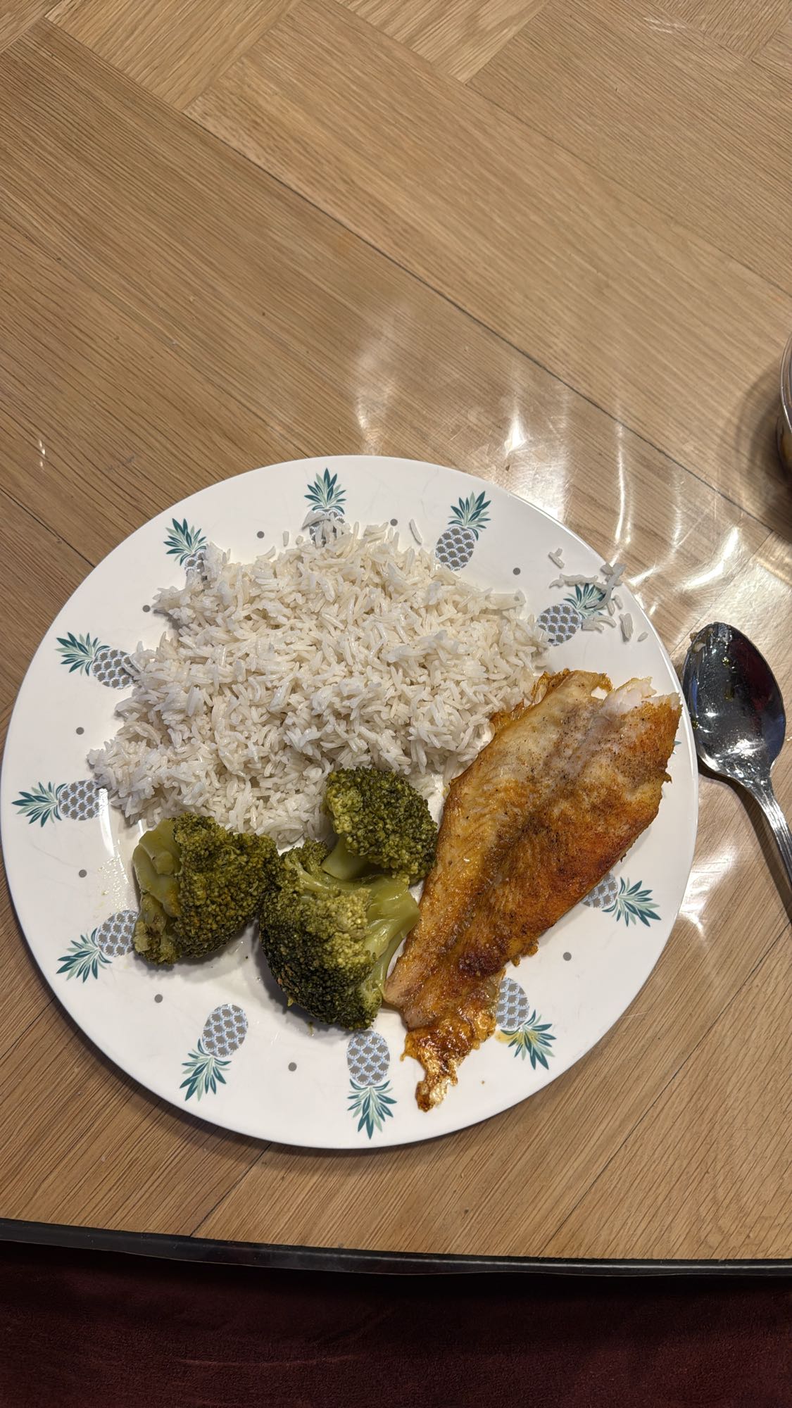 Fish, rice, and broccoli plate