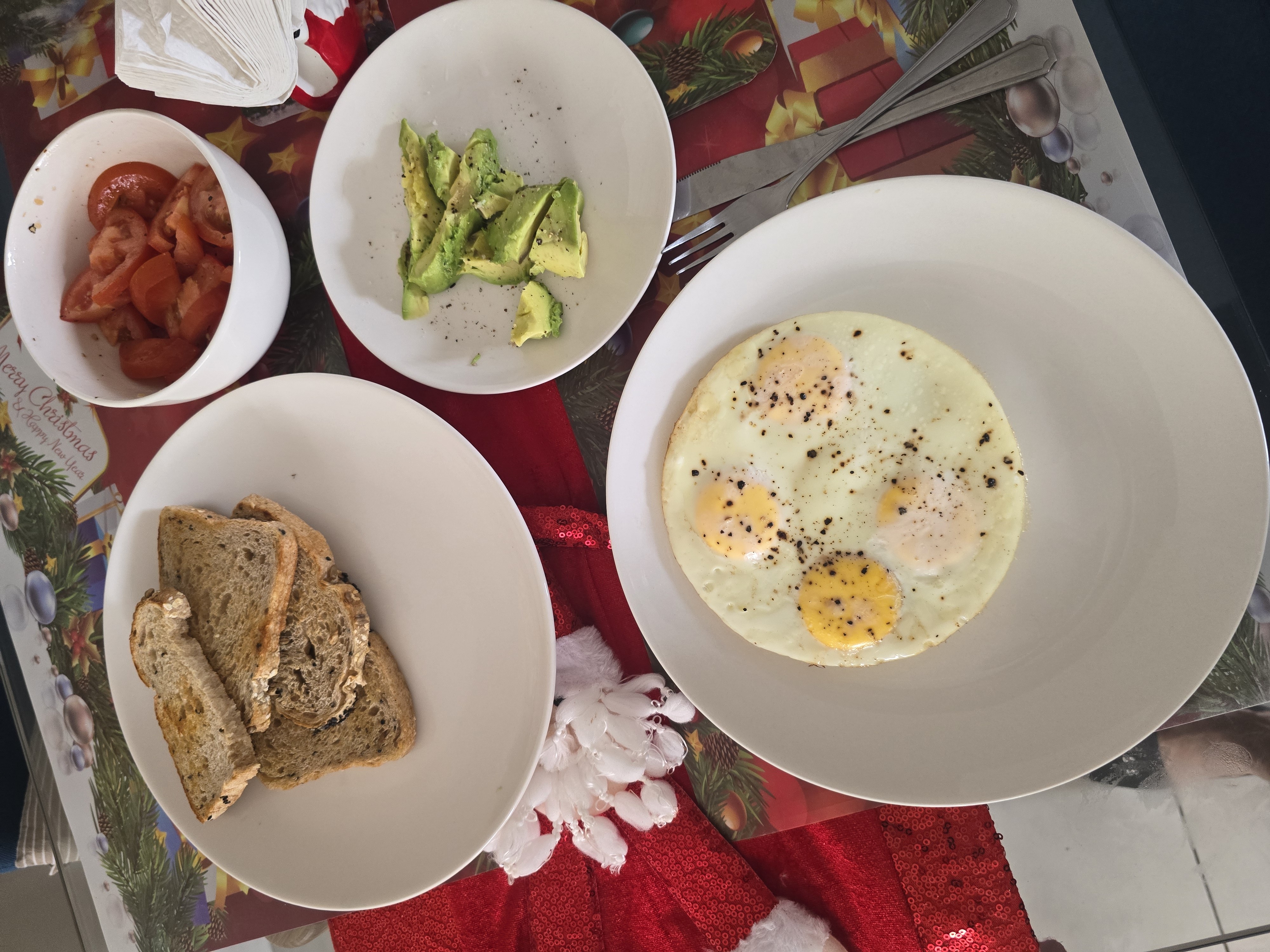 Eggs, toast, avocado, tomato