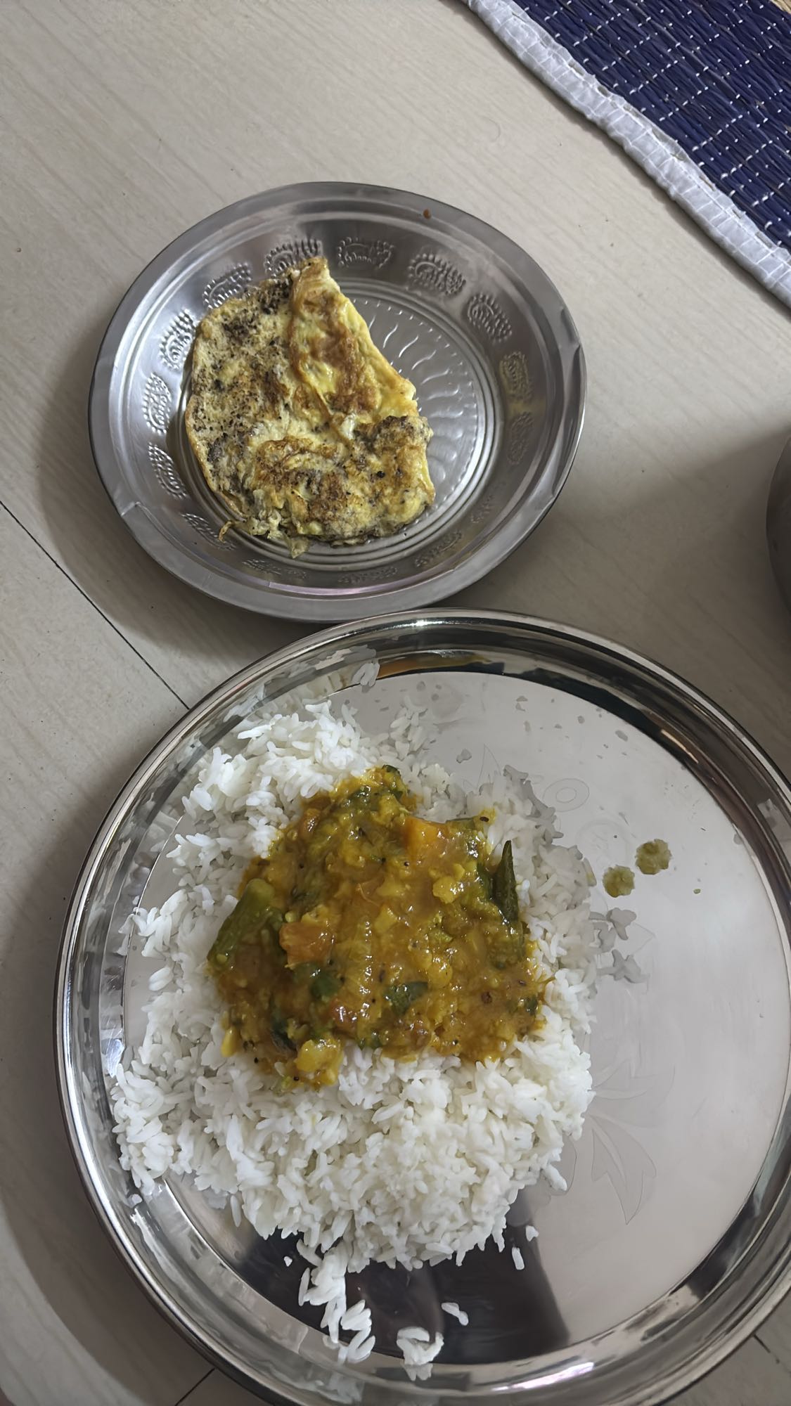 Rice with dal and omelette