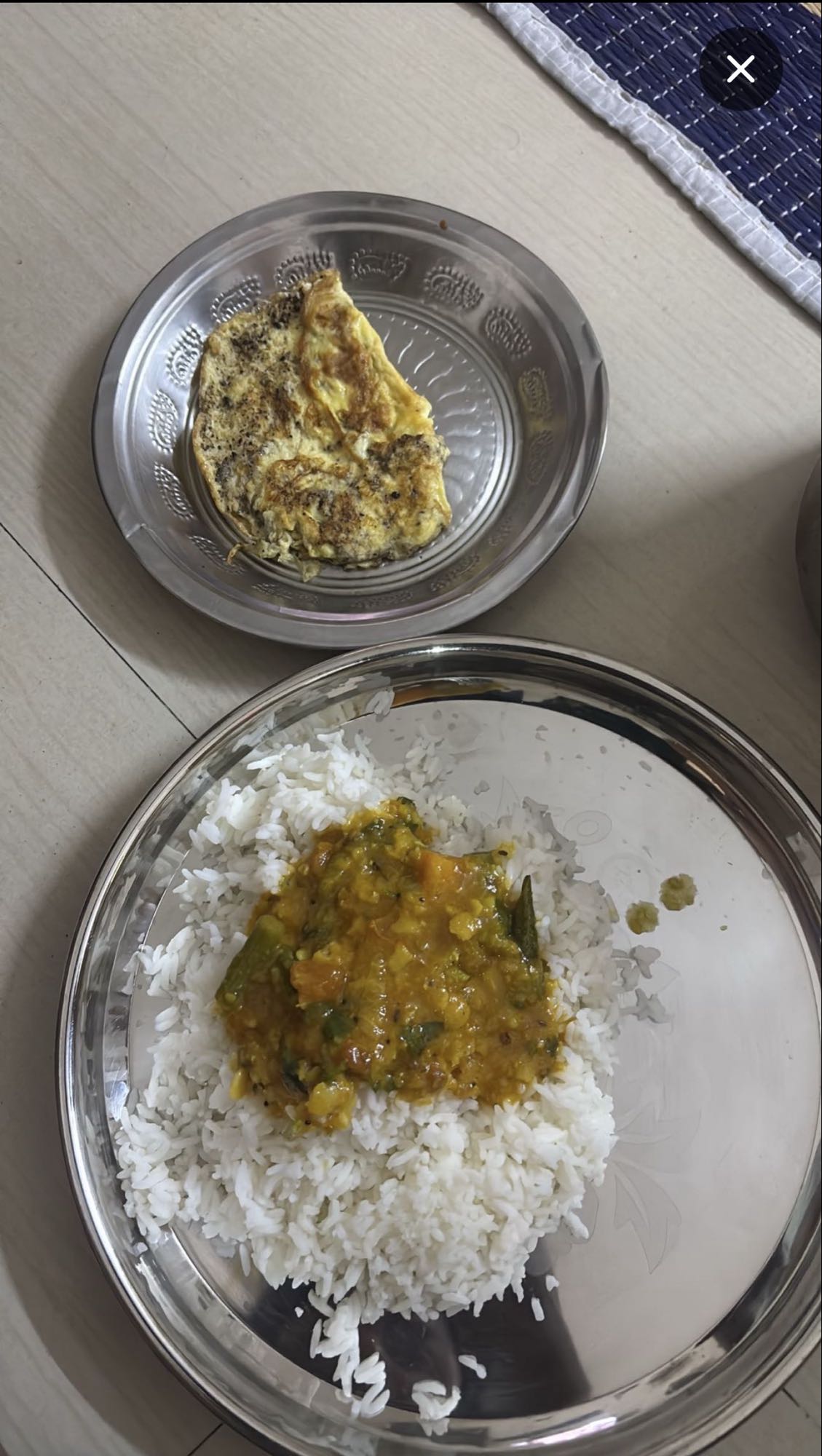 Rice with dal and omelette