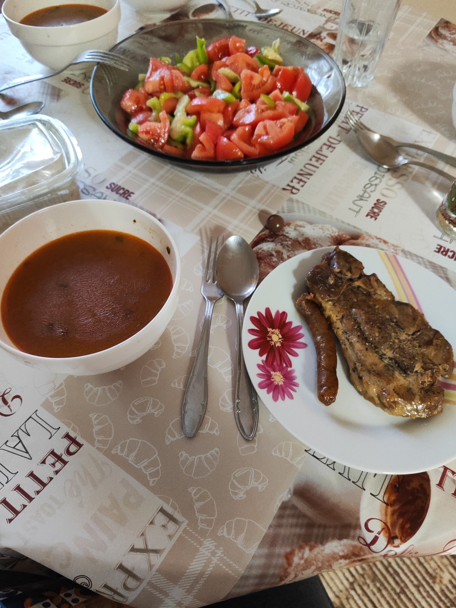 Steak, sausage, salad, soup