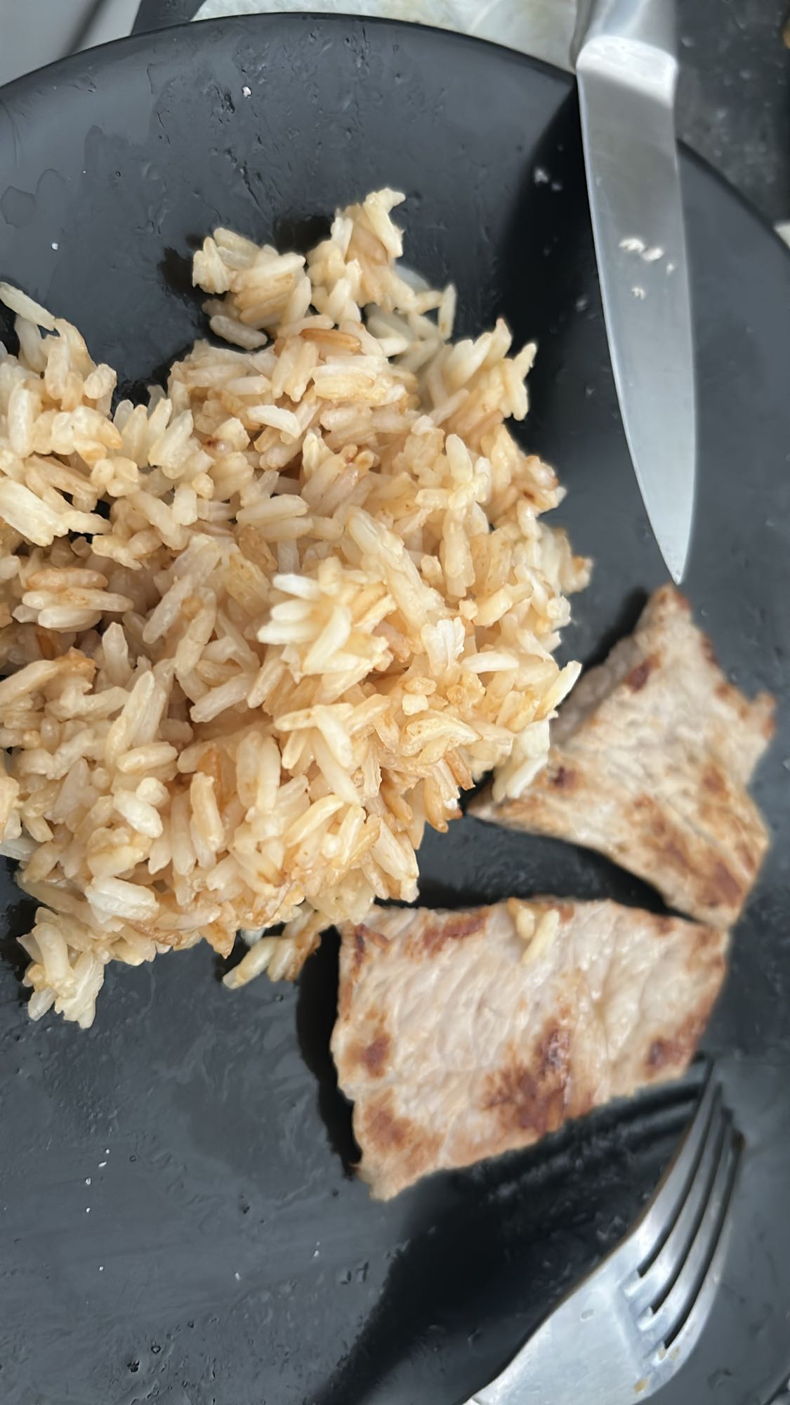 Riz blanc cuit et escalope de veau