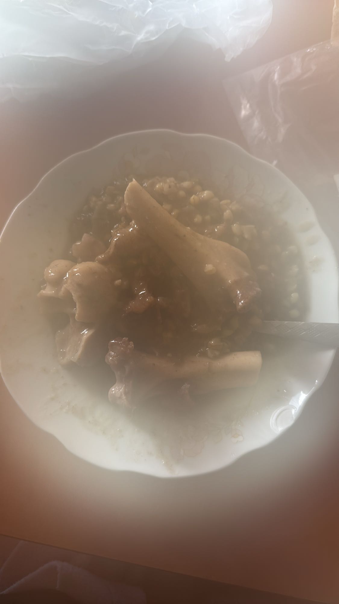 Beef bone stew with grains