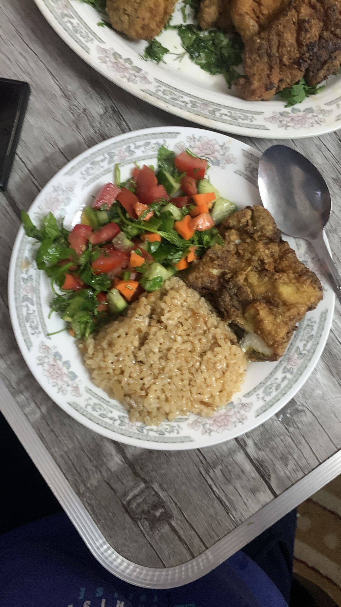 Fried fish with rice salad