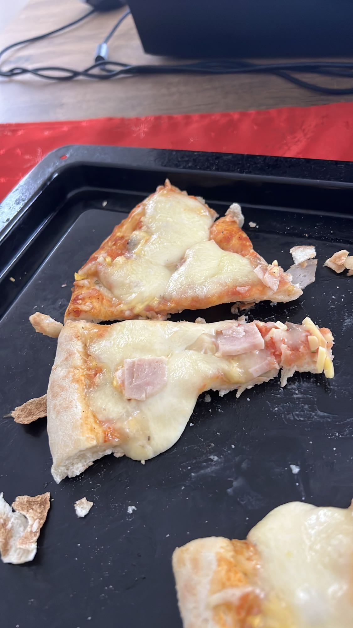 Ham and cheese pizza slices