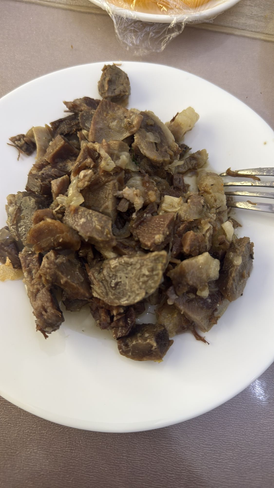 тушёные говяжьи субпродукты