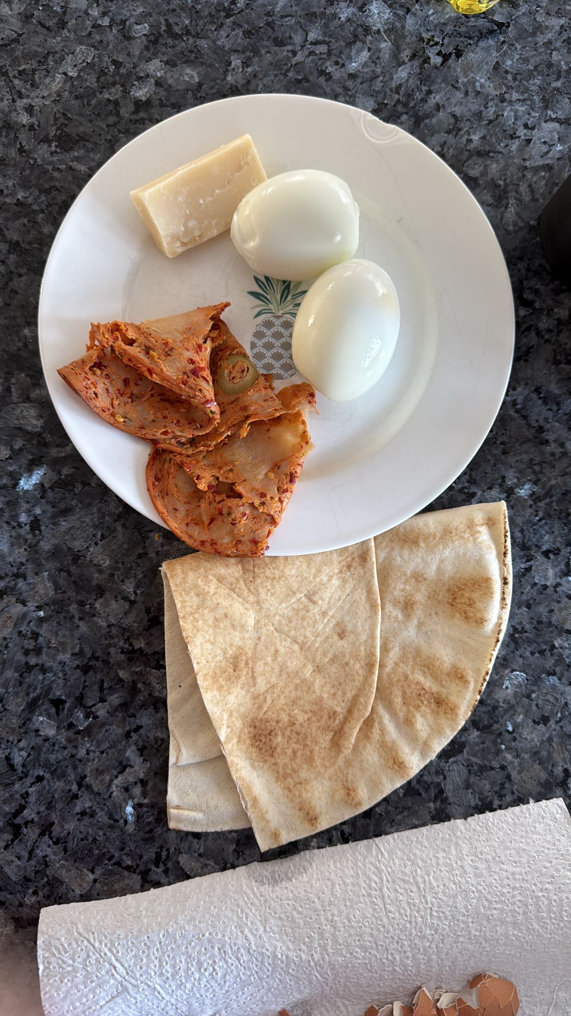 Eggs, cheese, sausage, pita