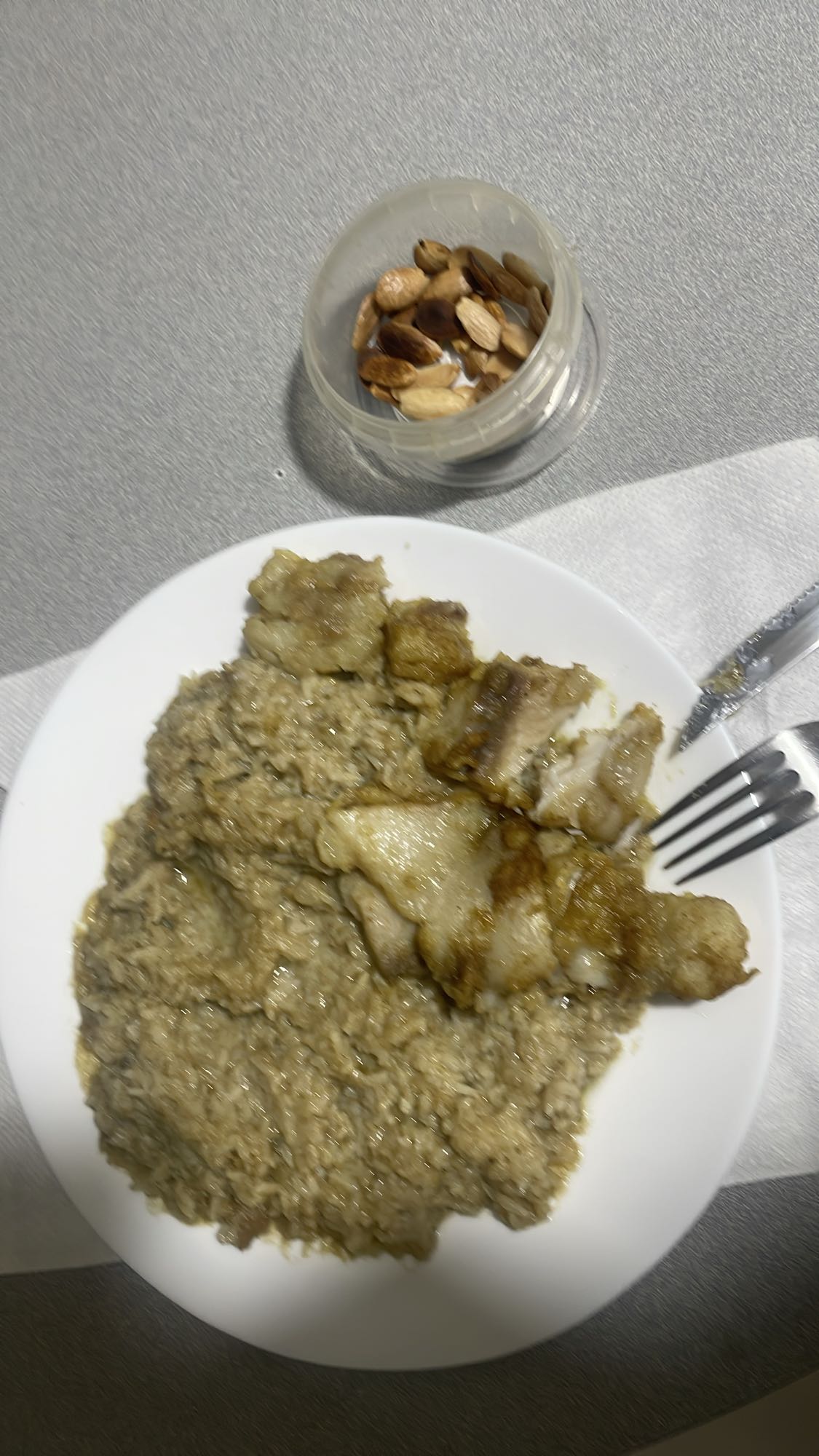 Fried fish with rice and nuts