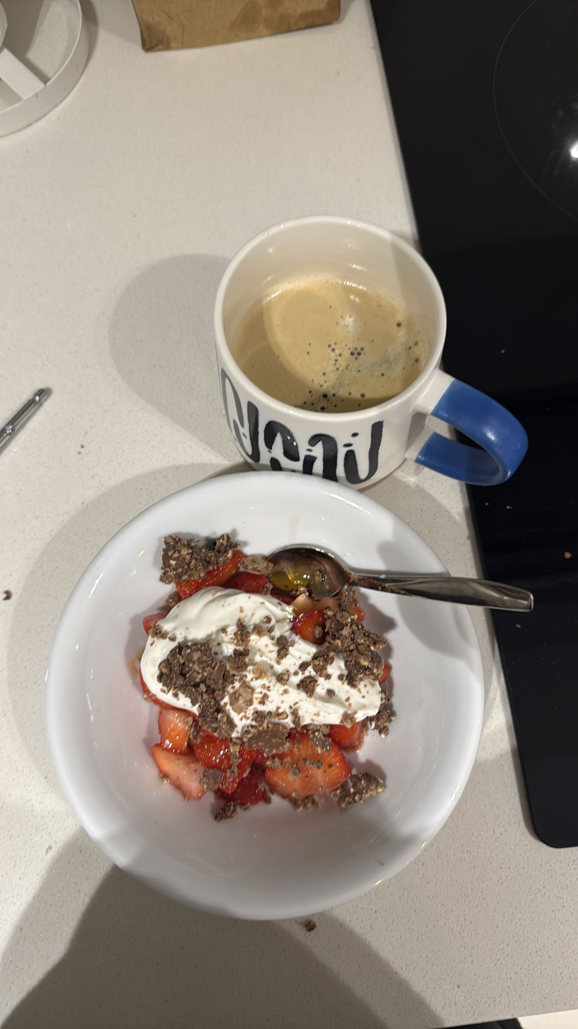 Yogurt, berries, granola, coffee