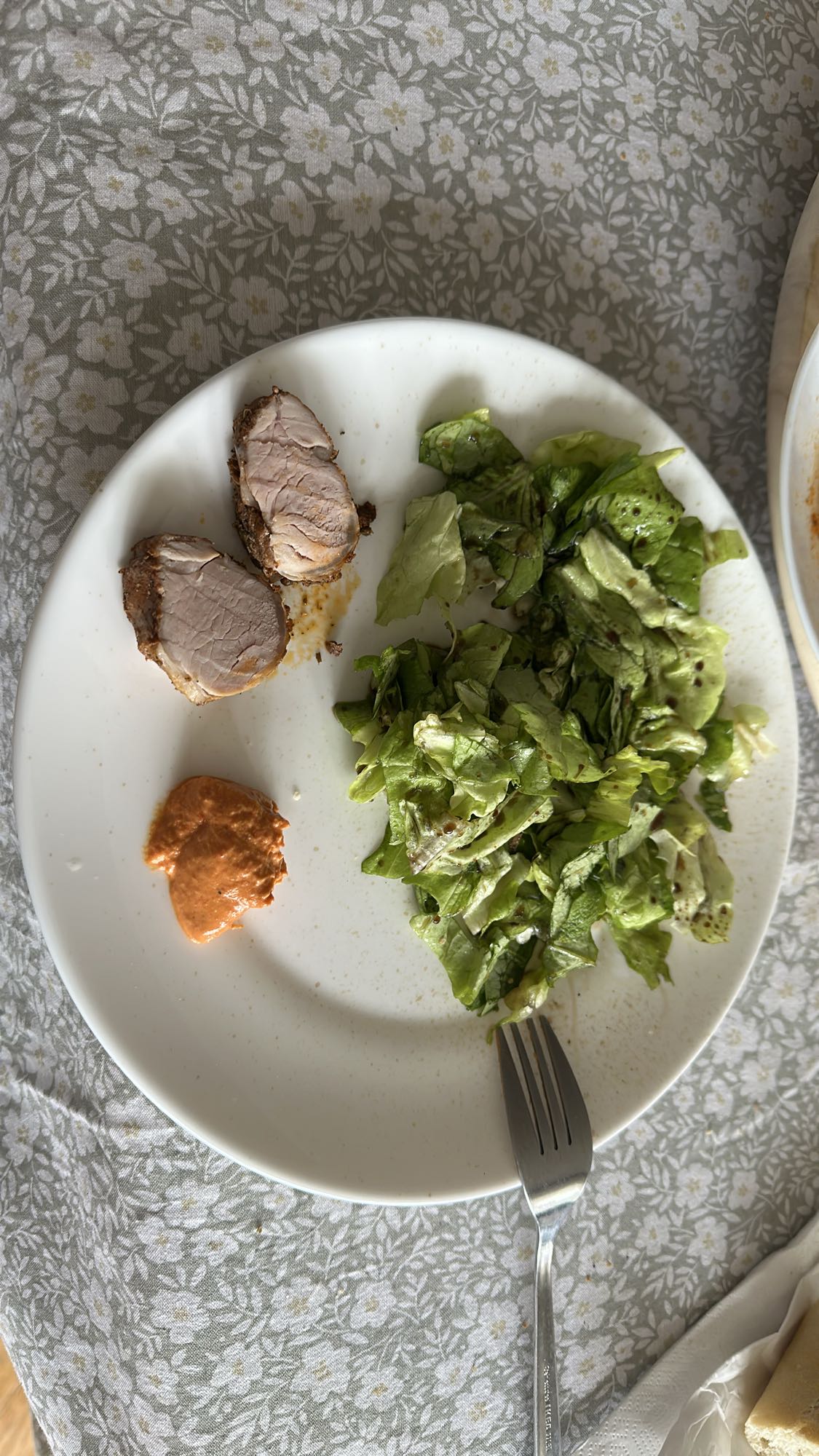 Pork, salad and red sauce