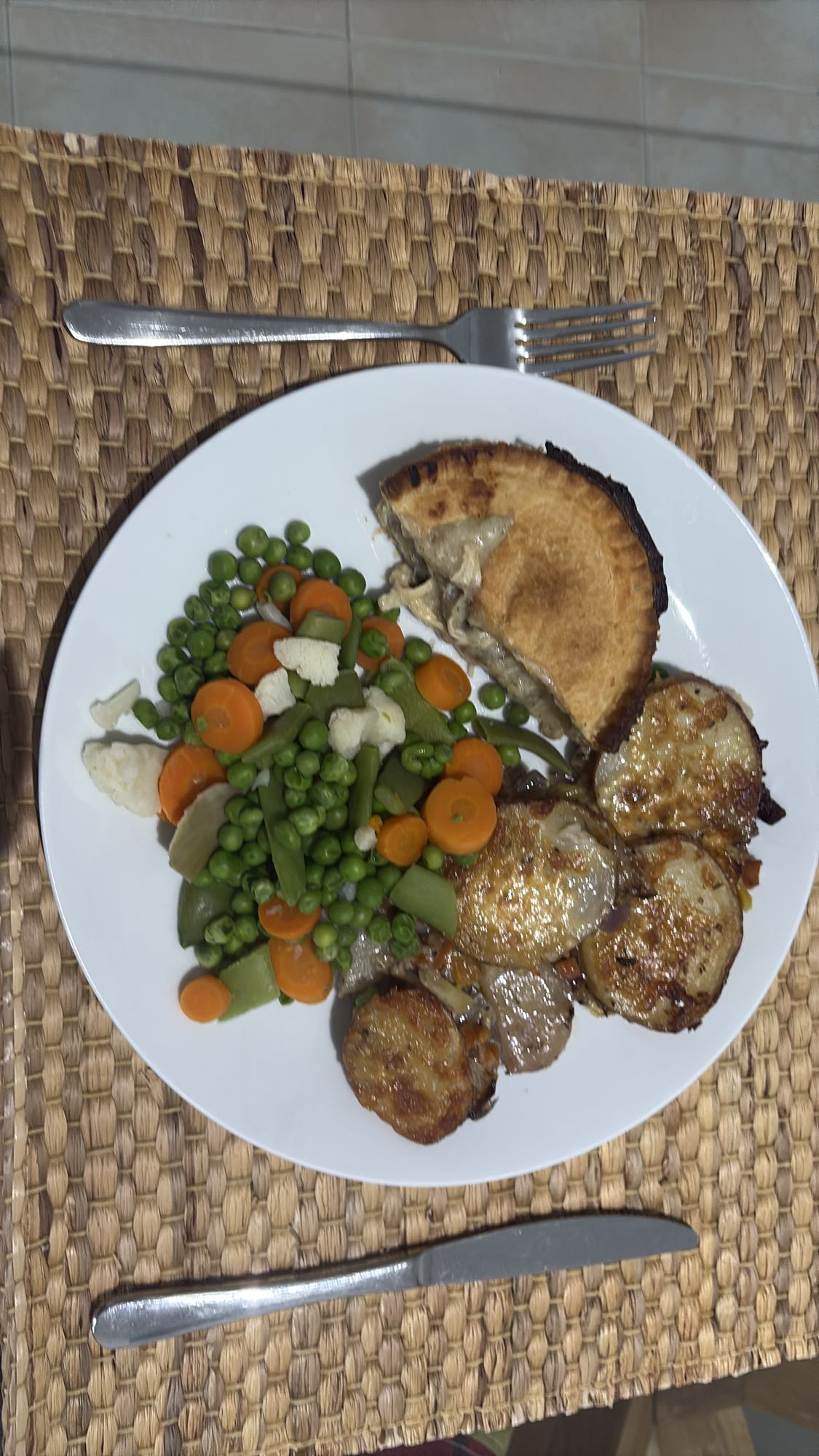 Chicken and mushroom pie, roasted potatoes, vegetables