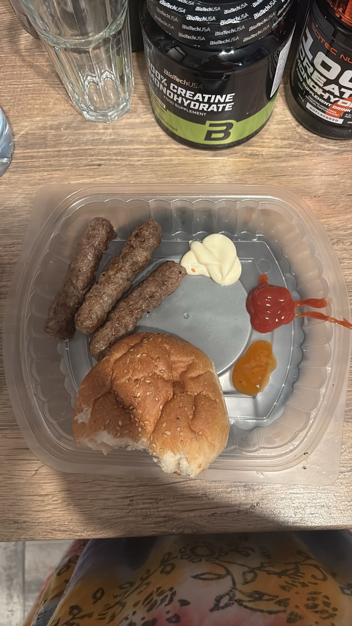 Kebabs with bun and sauces