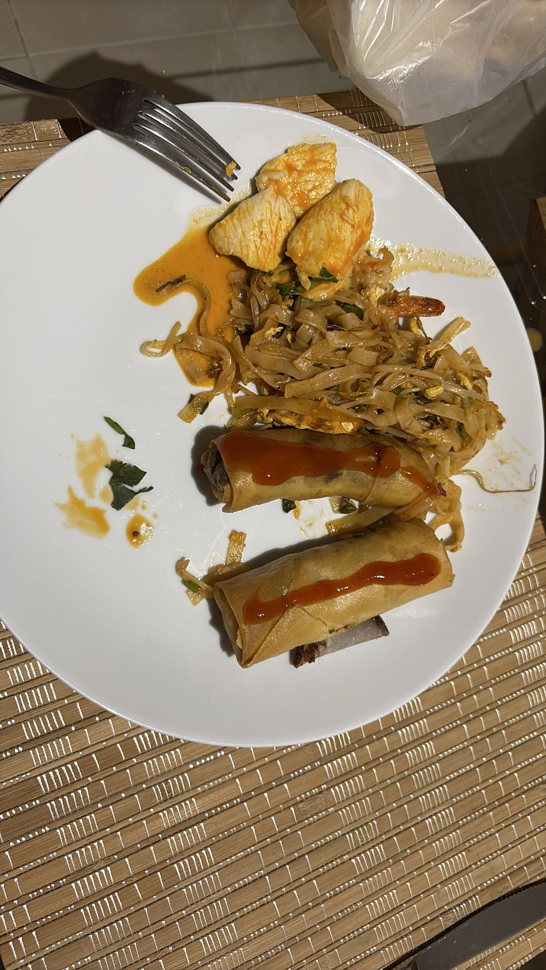 Chicken noodles and spring rolls