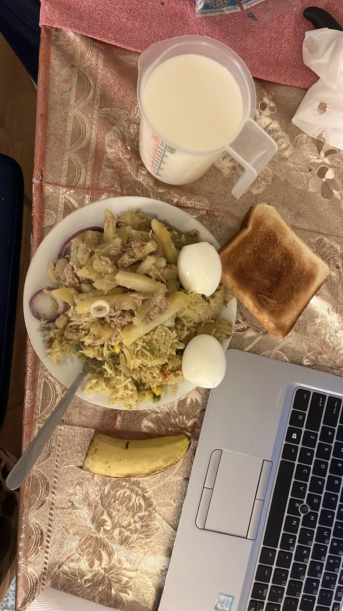Eggs, rice, toast, milk, banana