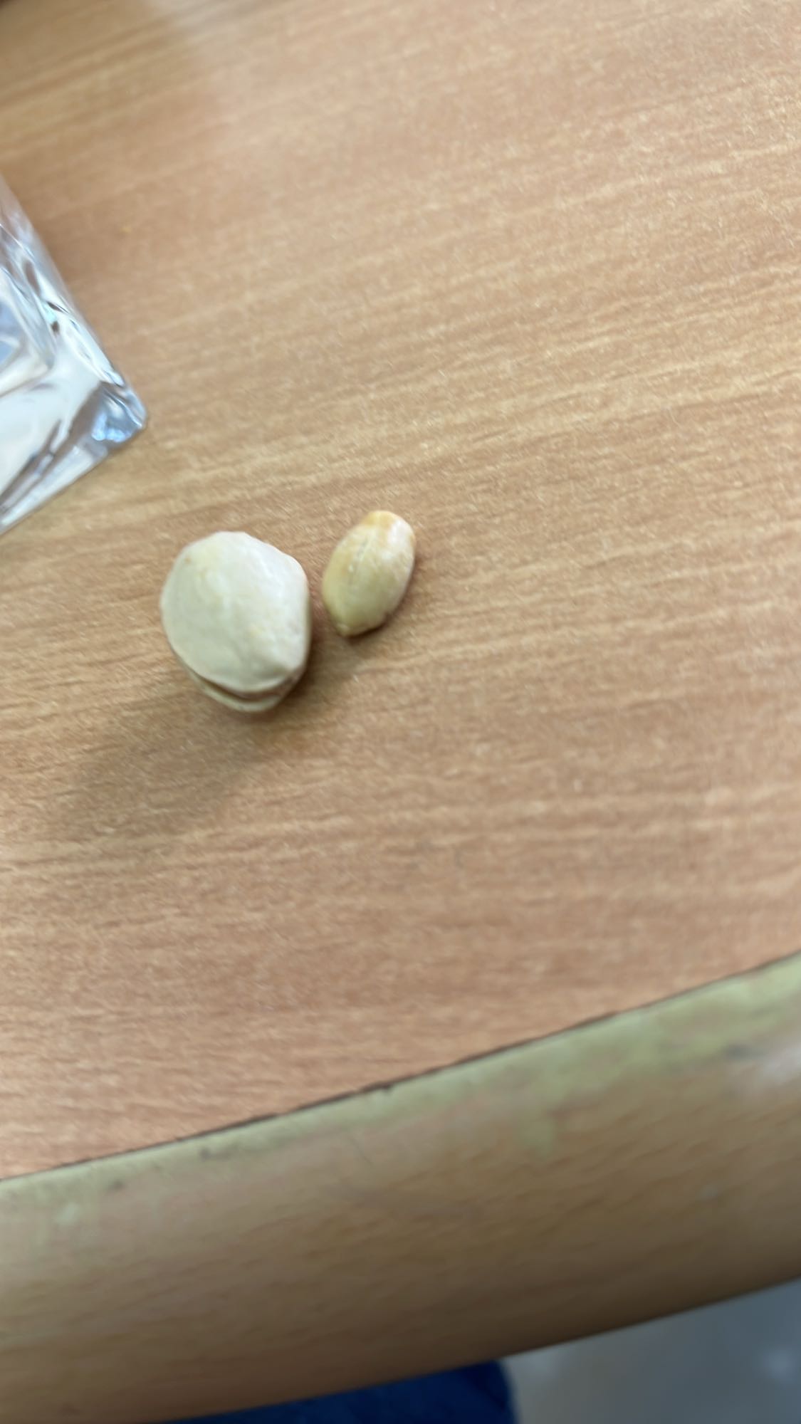 Five pistachios and five almonds